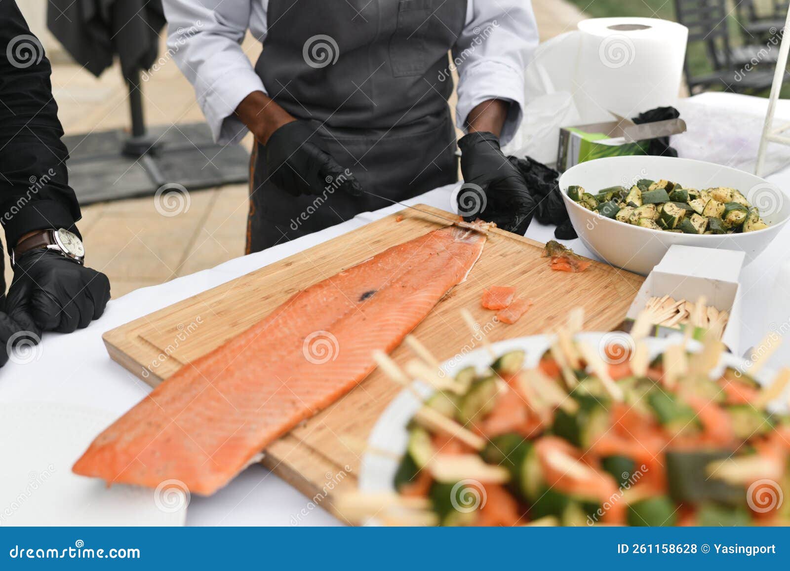 The Cooks Cut Salmon Fish at a Wedding Stock Photo Image of cook