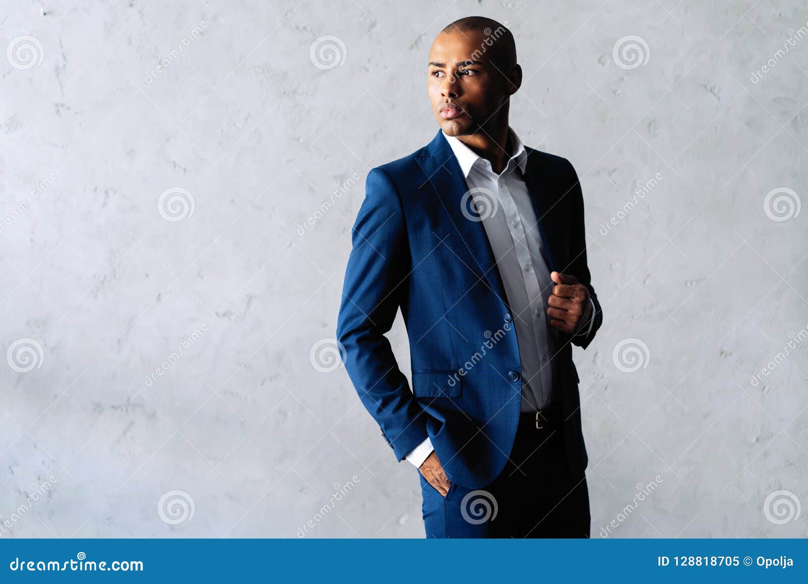 Cool African Businessman Standing on Grey Background. Stock Image ...