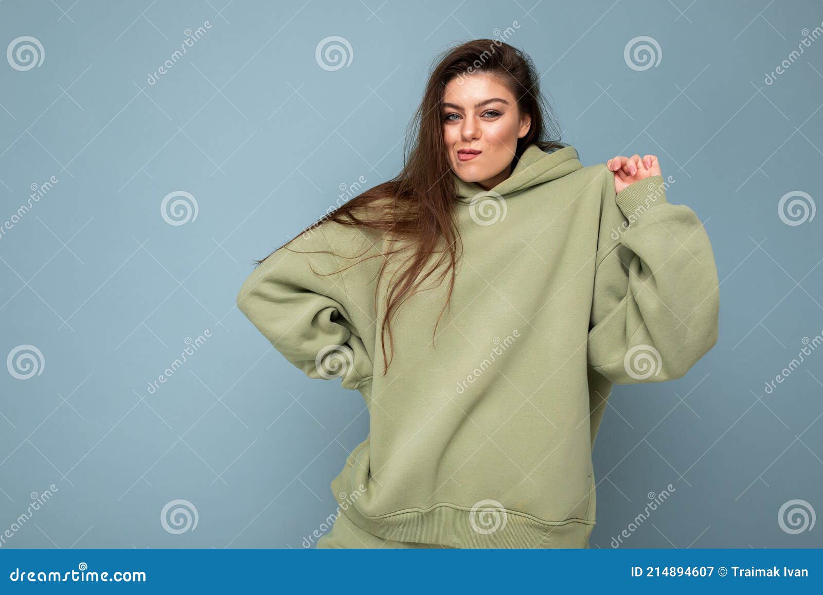 Cool Beautiful Young Brunette Cool Woman in a Stylish Khaki Hoodie on ...