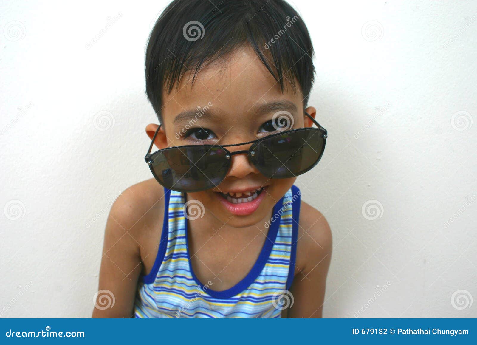 Cool Boy With Large Sunglasses Stock Photo | CartoonDealer.com #679182