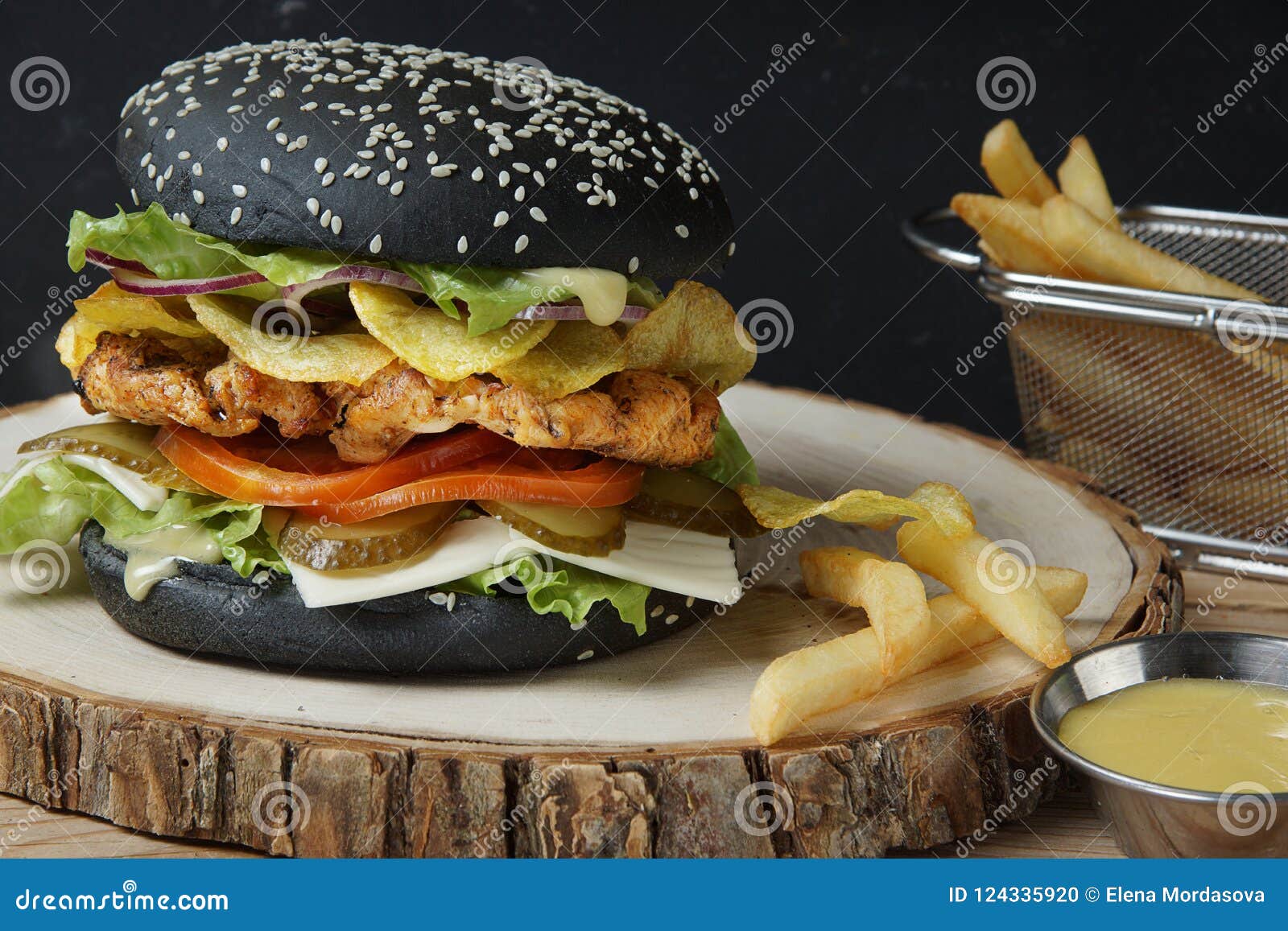 A Cool  Burger  With A Black Bun Sesame Seeds Inside 