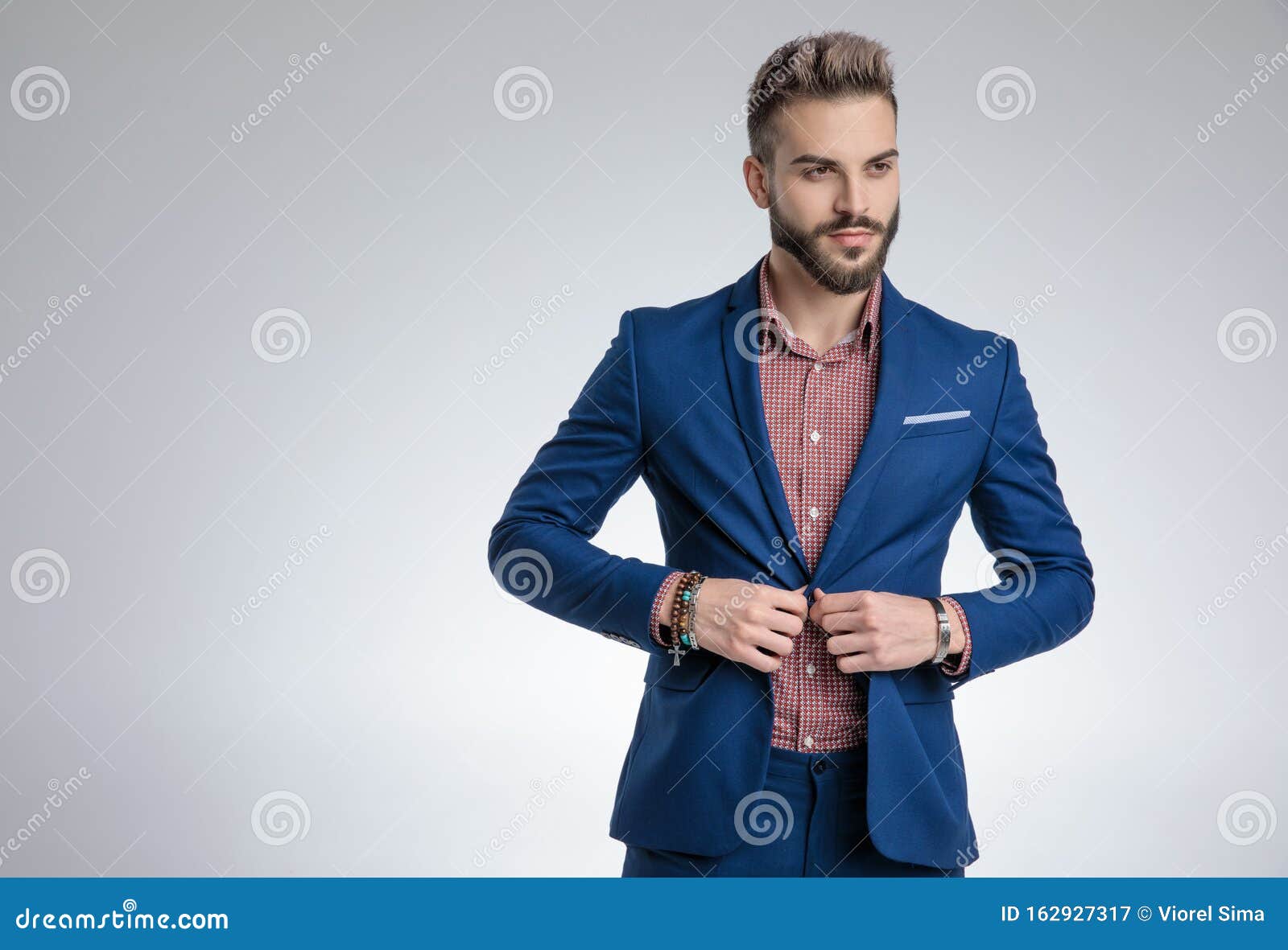 Cool Fashion Guy in Blue Suit Arranging Coat Stock Image - Image of ...