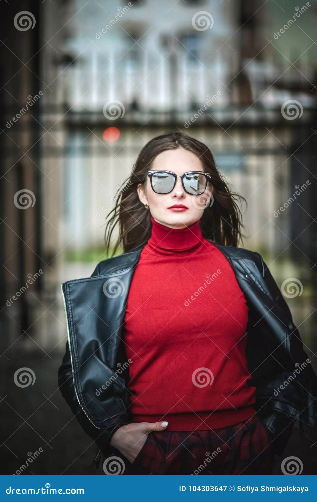 The Coolest Girl In The Black Leather Jacket And Sunglasses Walks 