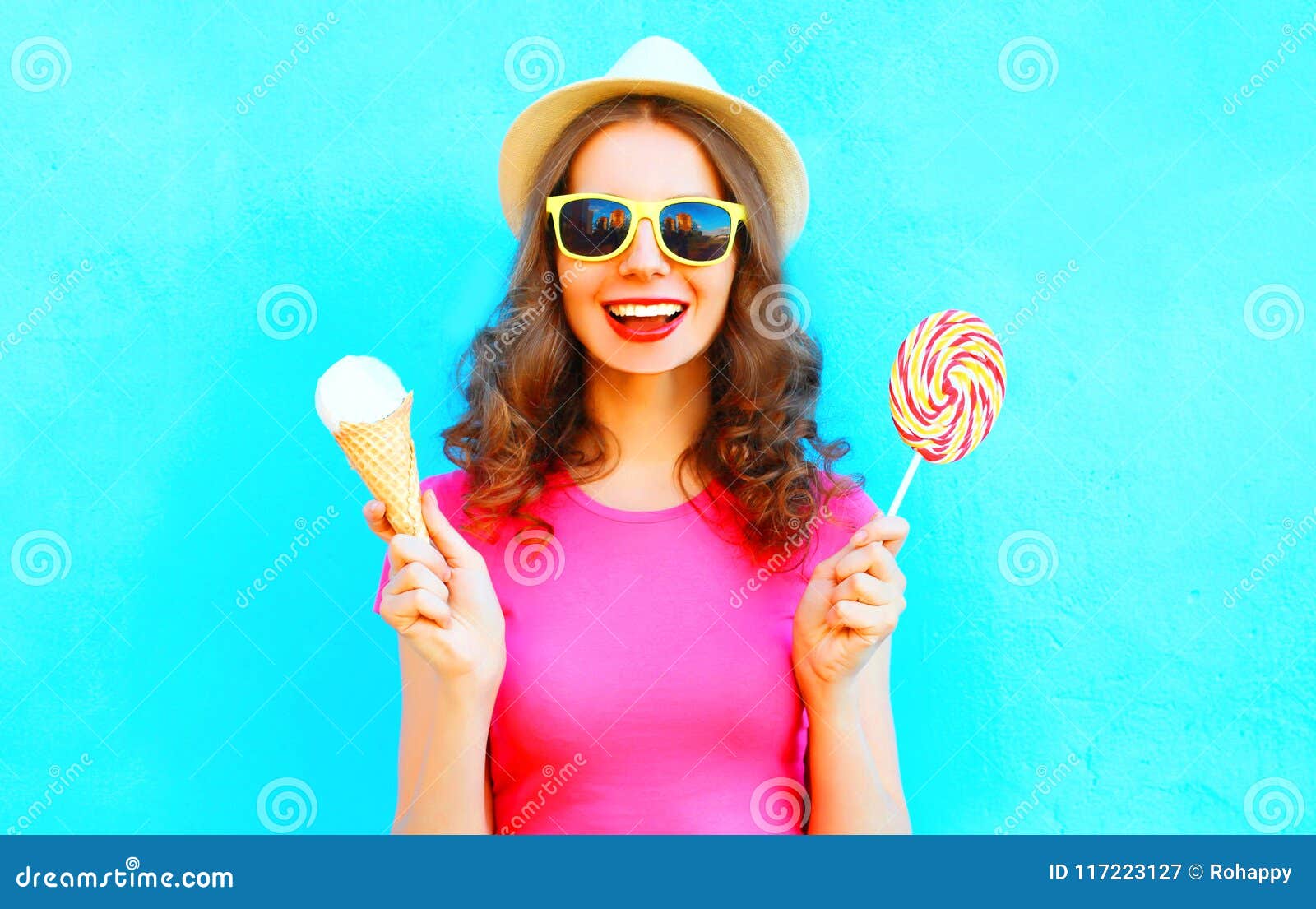 Cool Girl with Ice Cream and Lollipop Over Colorful Blue Stock Image ...