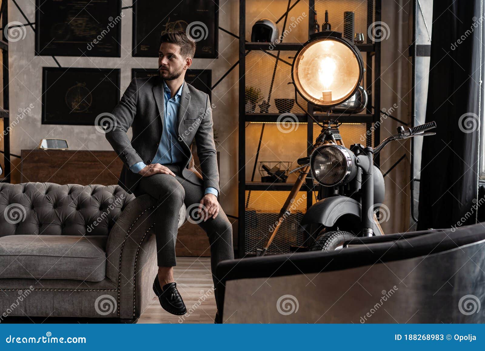 Cool and Handsome. Good Looking Young Man in Full Suit Sitting on the ...