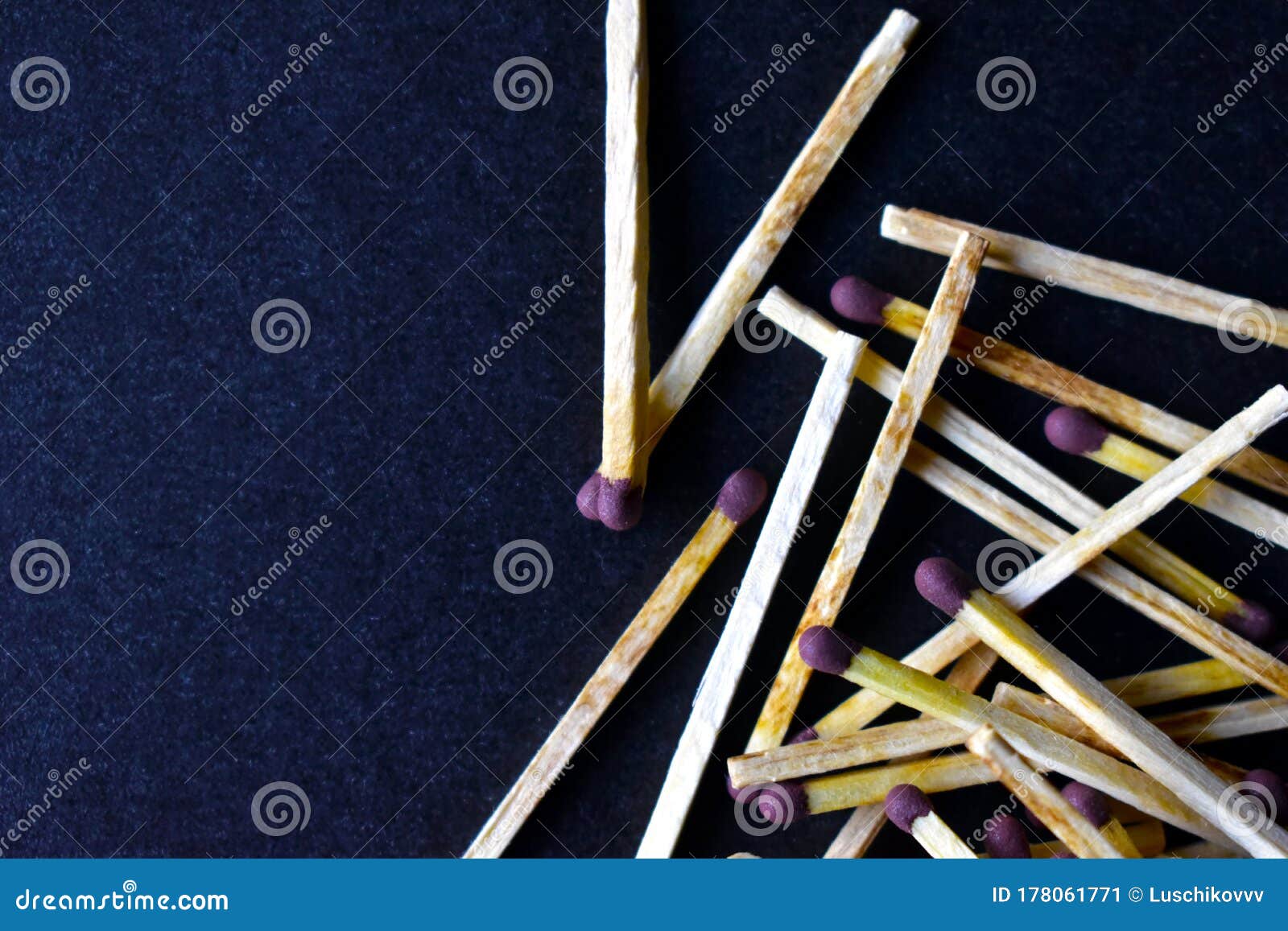 household matches and boxes for lighting on a blue background