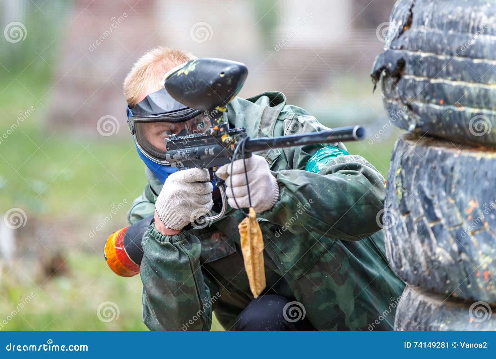 Cool Paintball Player Shooting from Marker Outdoors Stock Image Image