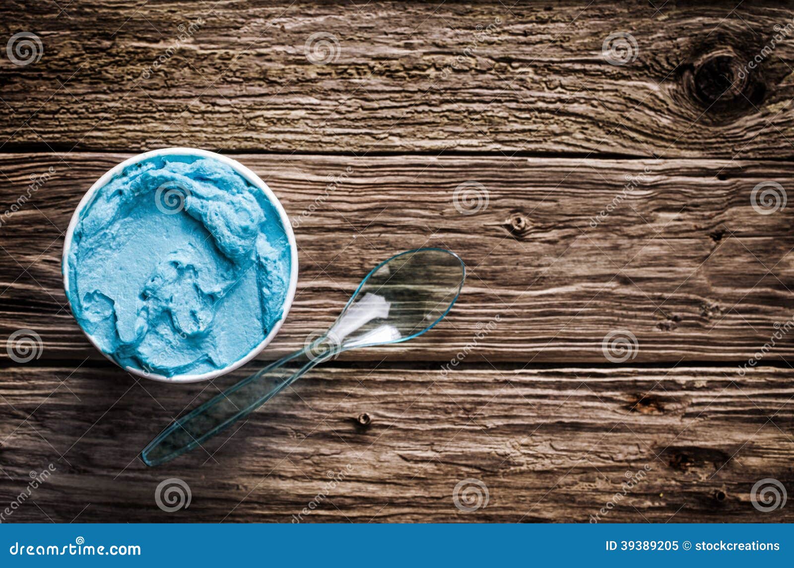 cool refreshing blue italian ice cream in a tub