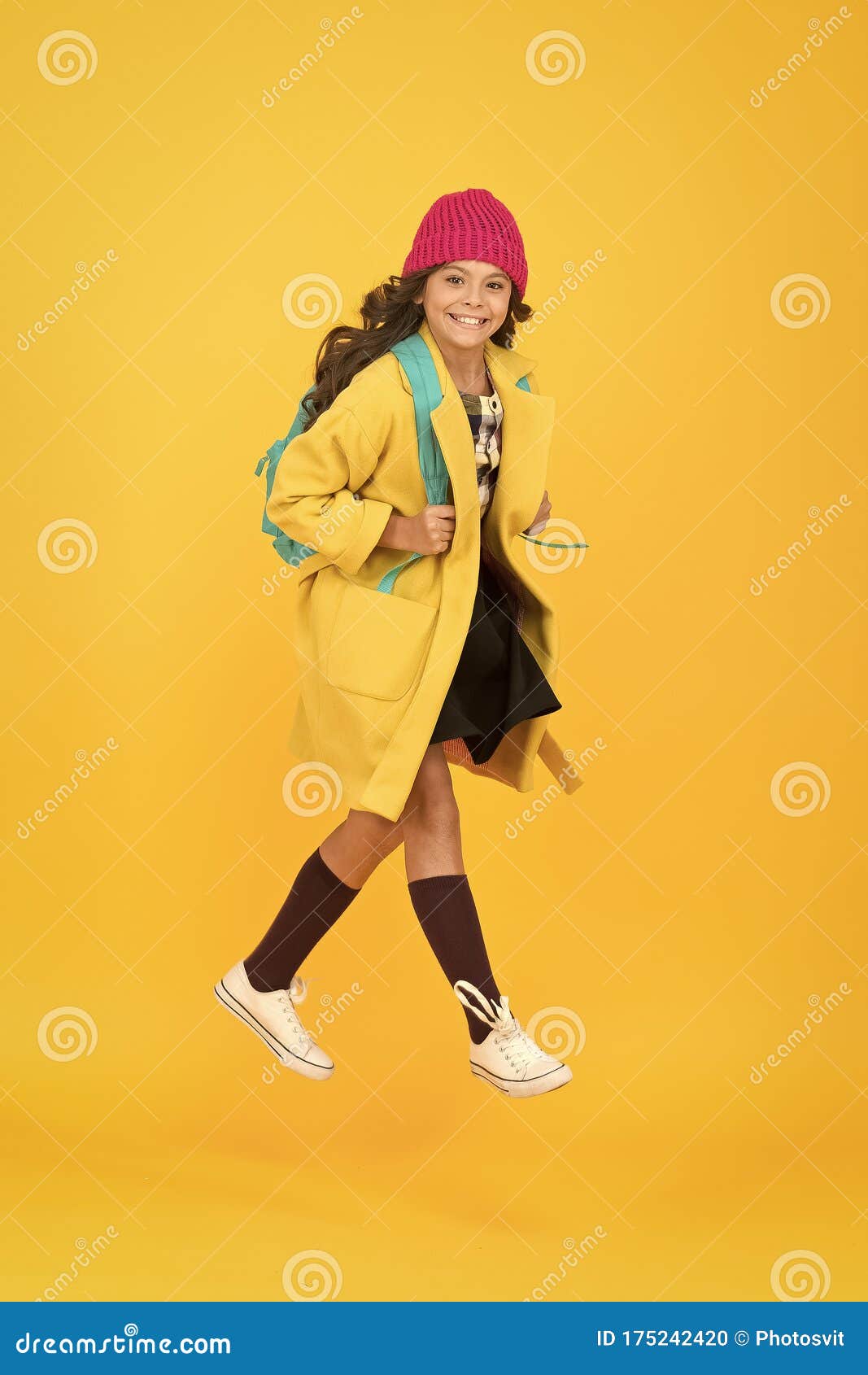 cool schoolgirl. have fun charismatic girl on yellow background. madcap concept. teen age. girl adorable stylish modern