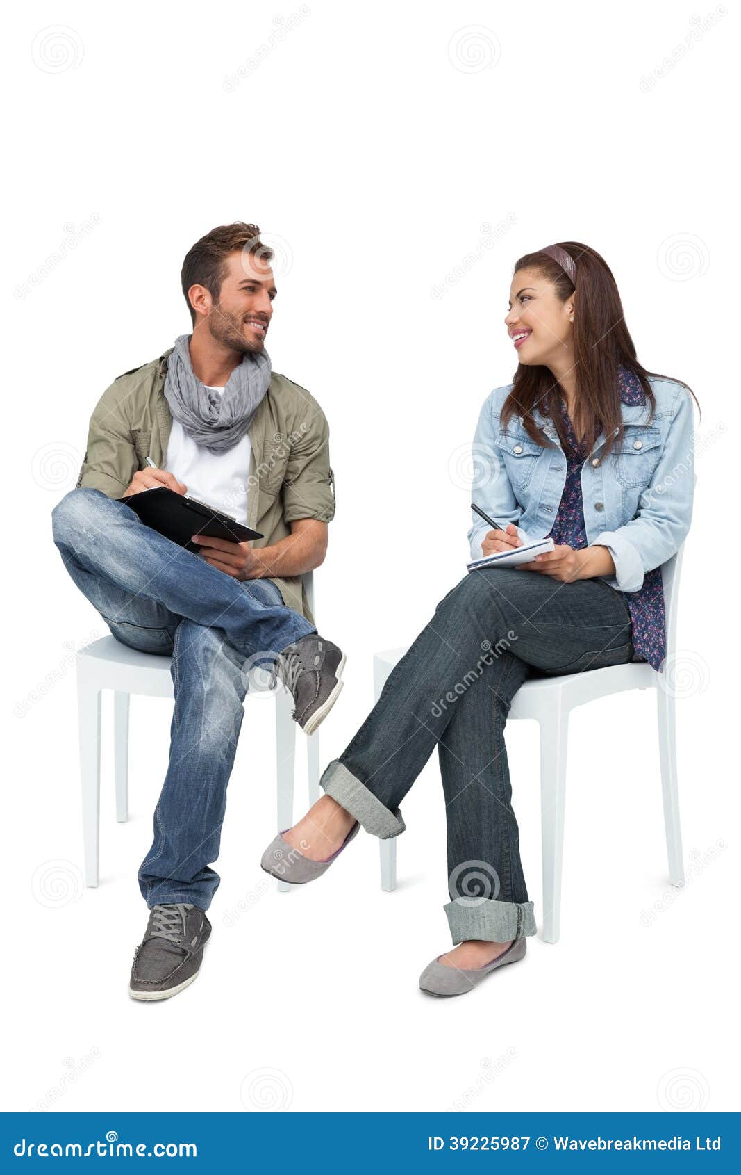 Cool Young Couple Writing in Notepads Stock Image - Image of attractive ...