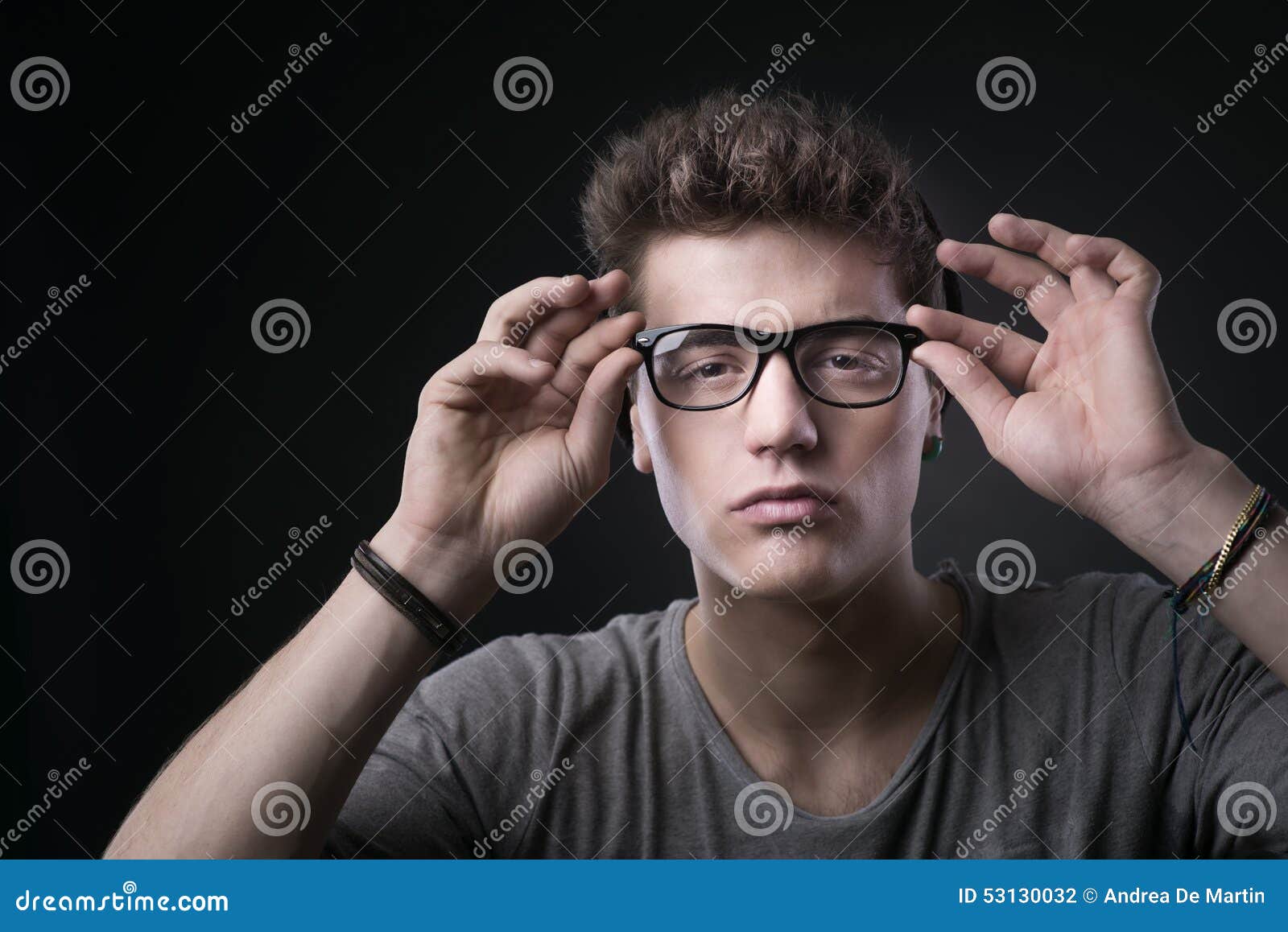 Cool Young Man Adjusting His Glasses Stock Photo Image of cool