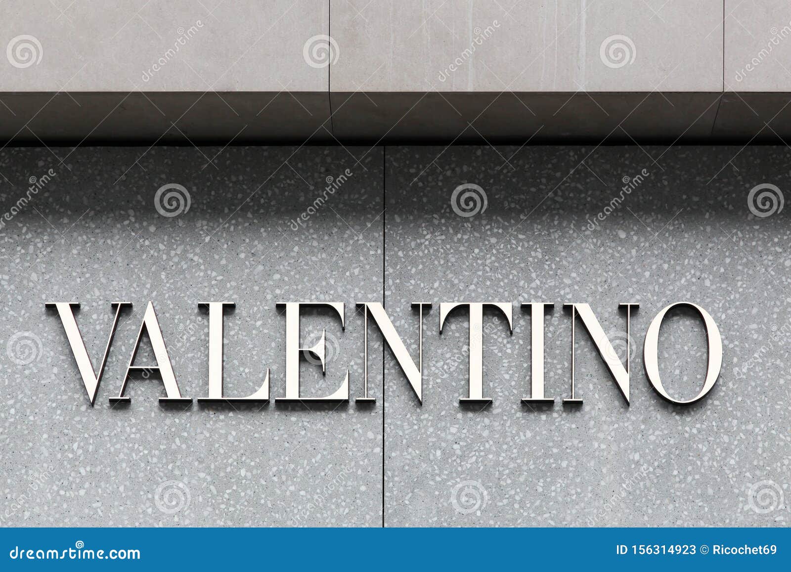 Valentino logo on a wall editorial stock photo. Image of retail - 156314923