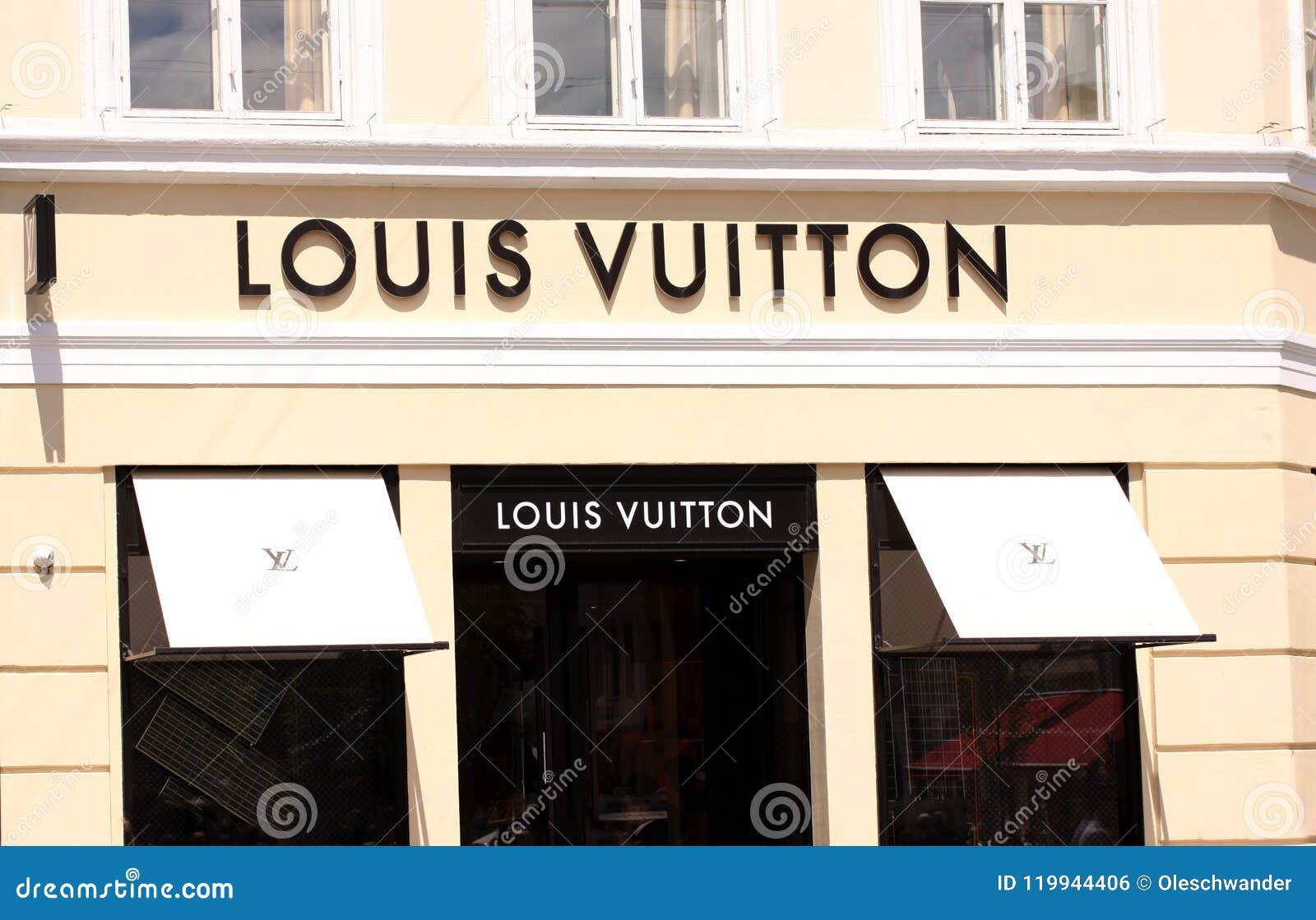 Louis Vuitton Logo Sign Panel on Shop. Louis Vuitton is a Famous