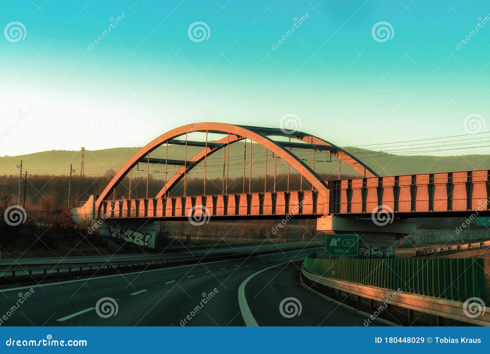 Coppercolored Railroad Bridge Over a Highway Stock Image Image of