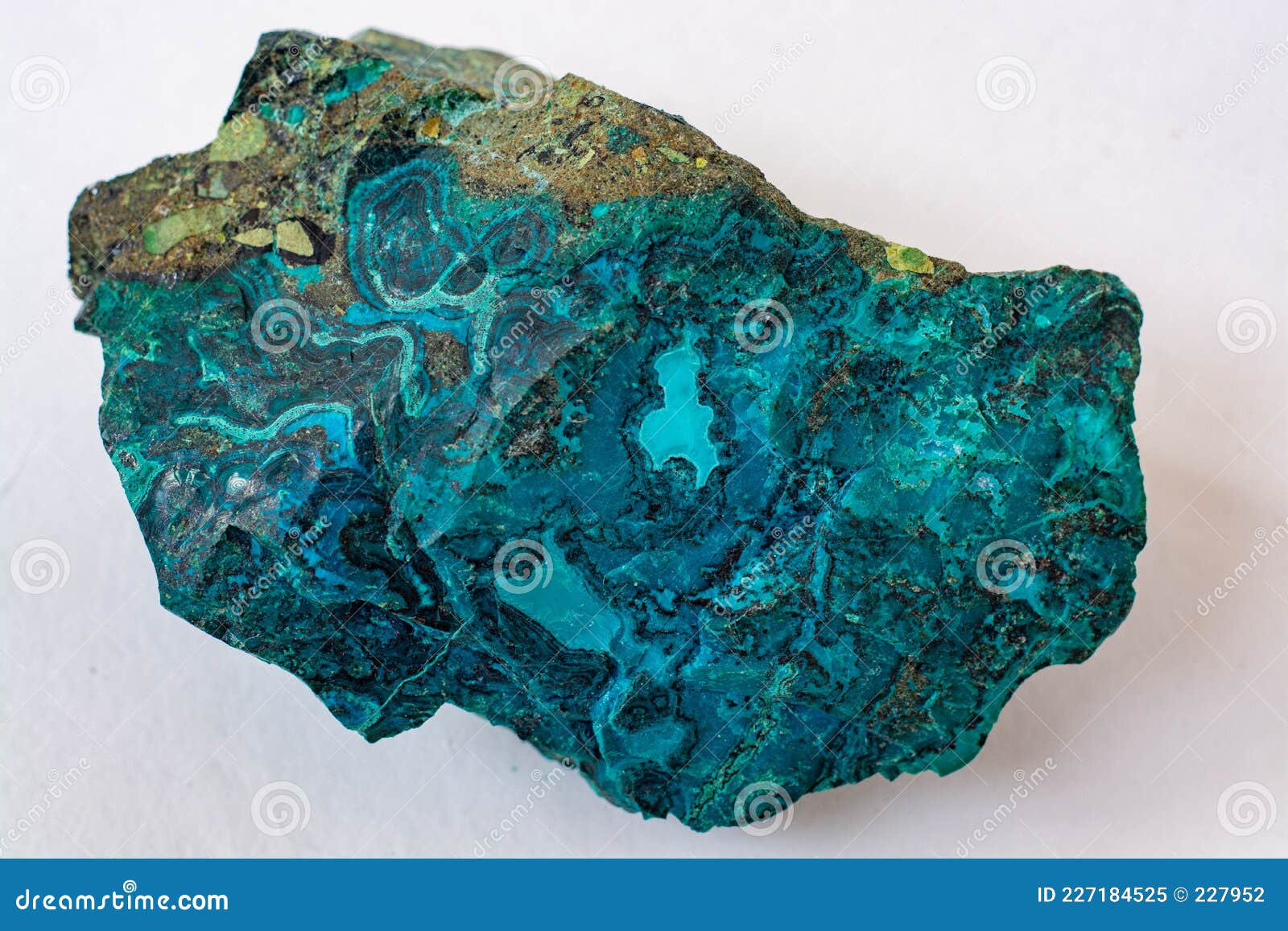 Copper Ore from a Copper Mine in Chile, a Green Stone on a White