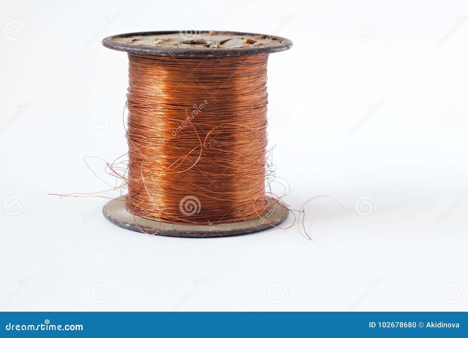 copper wire on spool,  on white backgrounds, with clipping paths on white background .