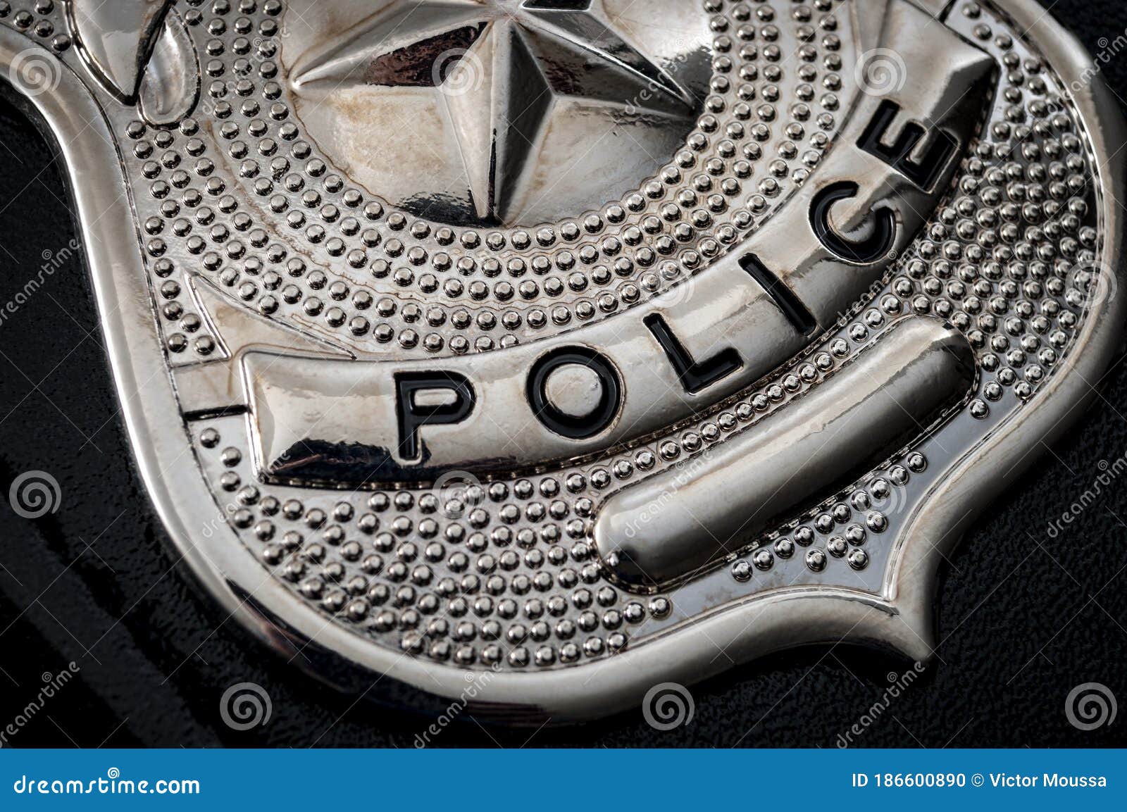 cops and police officer badge with macro close up on the