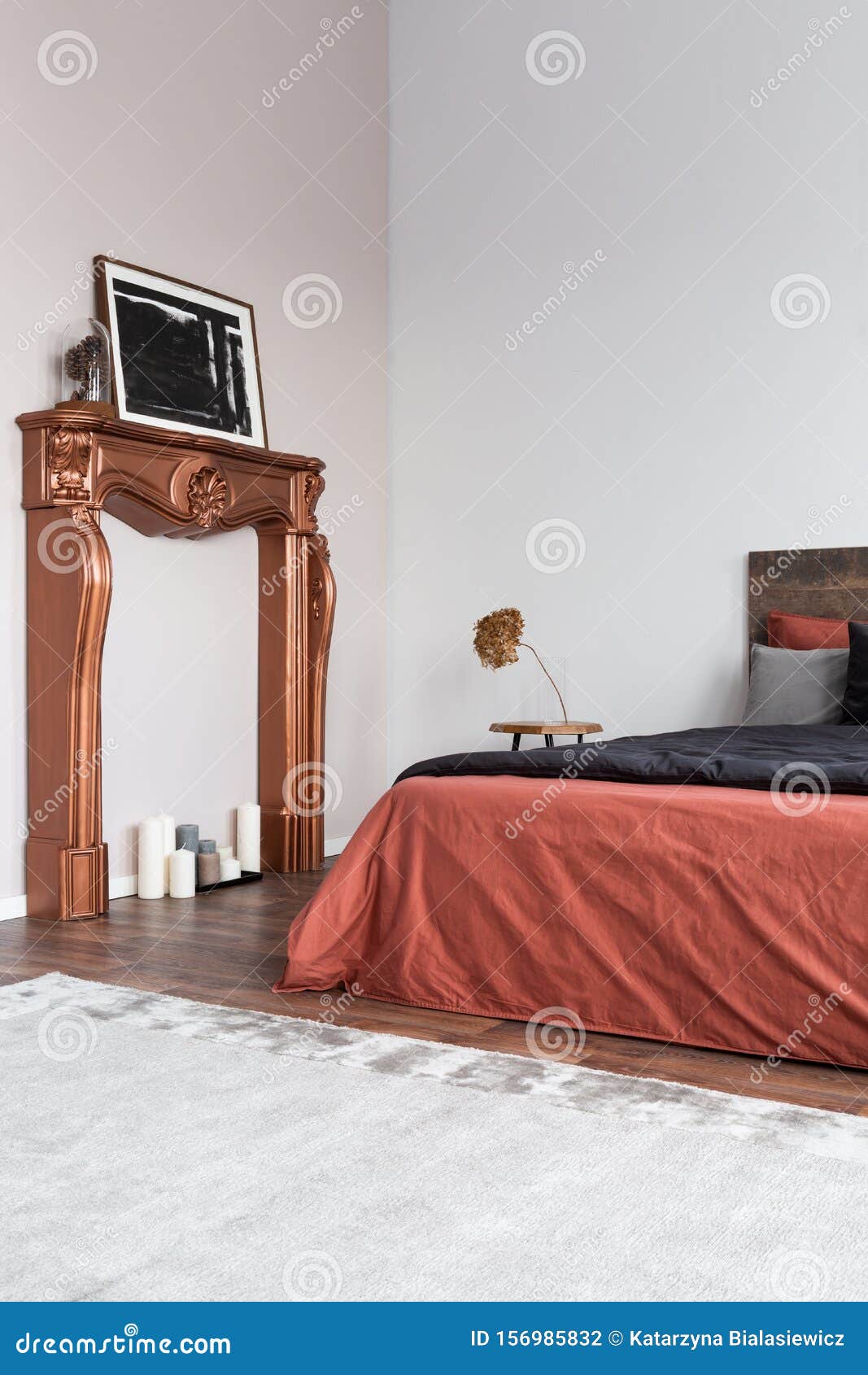Copy Space on Empty White Wall of Rustic Bedroom Interior Stock Photo