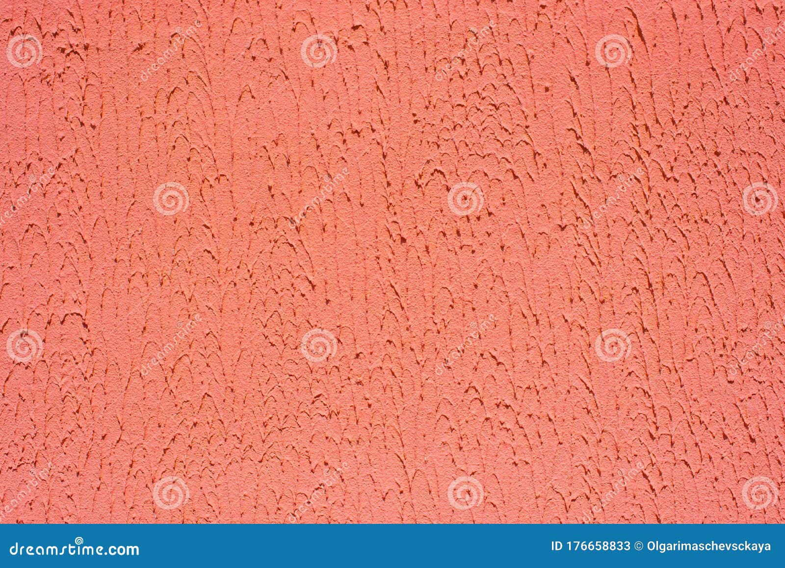 coral plaster wall. uneven texture of putty on the wall with copy space