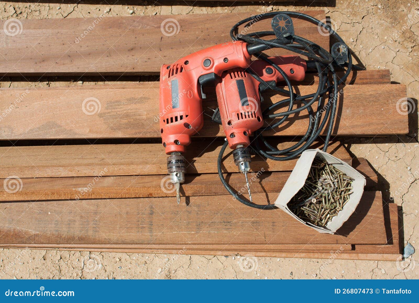 Cordless Drill and Large Screws on a Wood Stock Image Image of