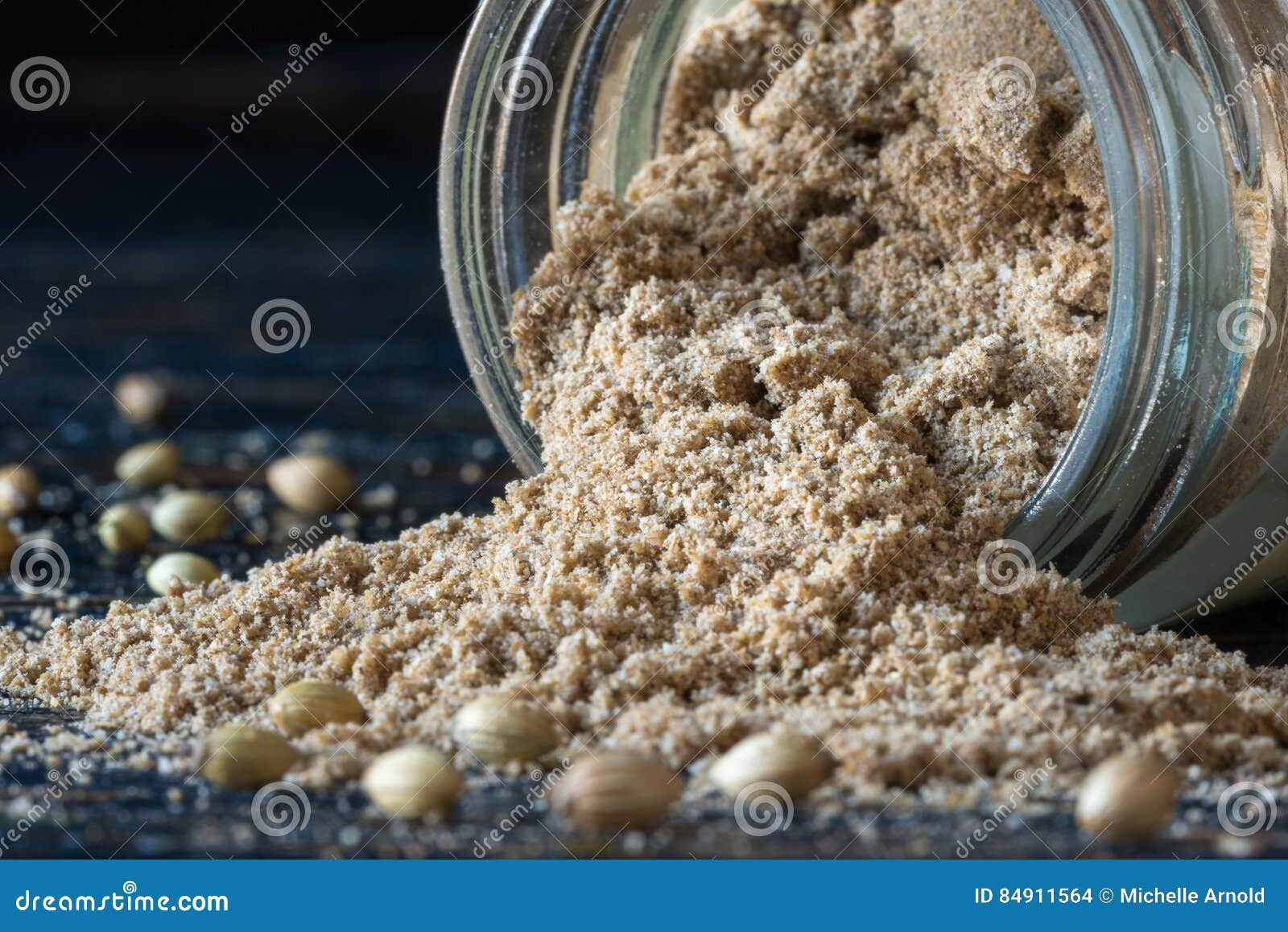 Ground Coriander Spilled from a Spice Jar Stock Photo Image of seeds, seasoning 84911564