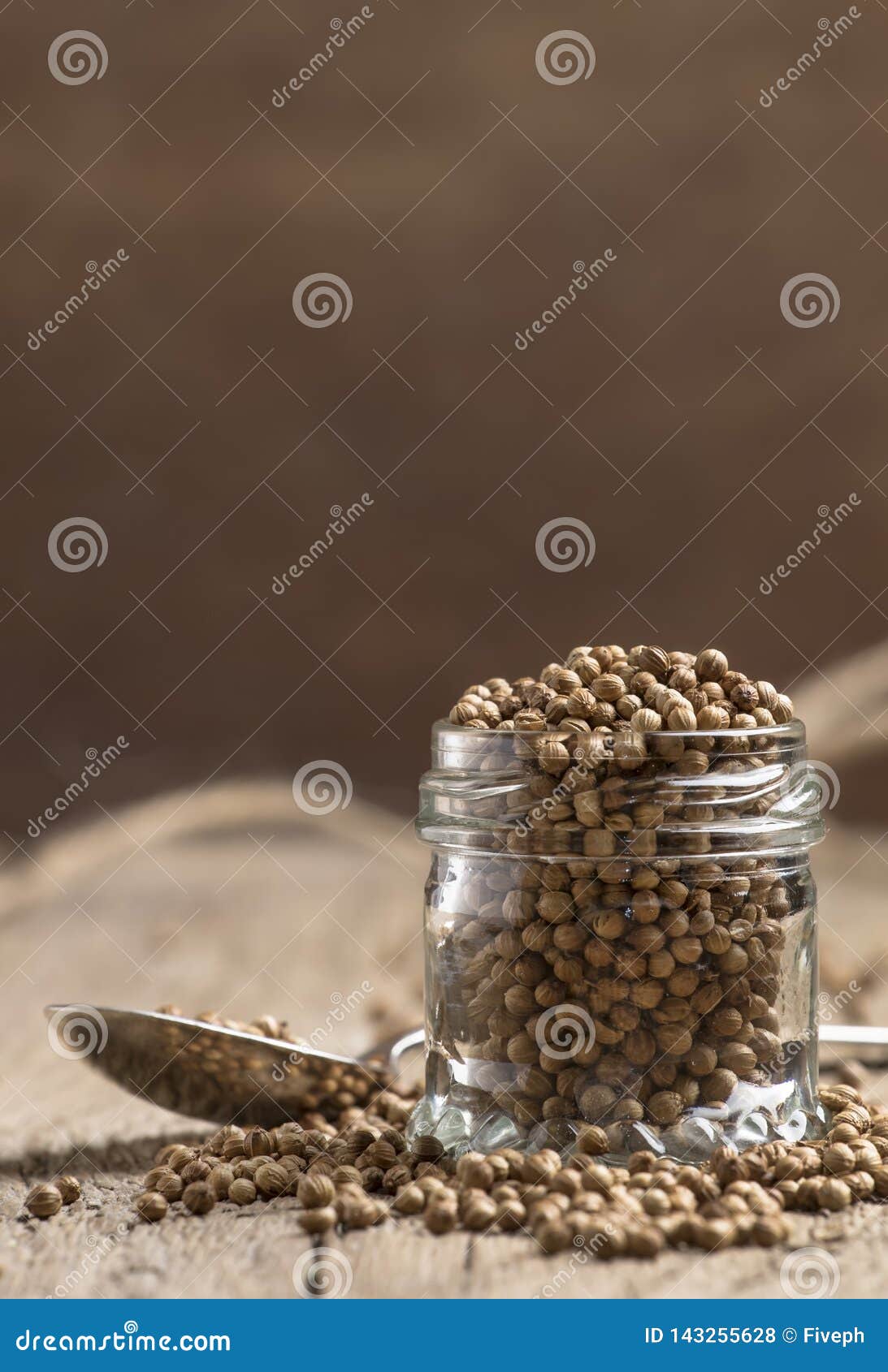 Coriander Seeds in Jar, Dry Oriental Spice, Rustic Style, Old Kitchen