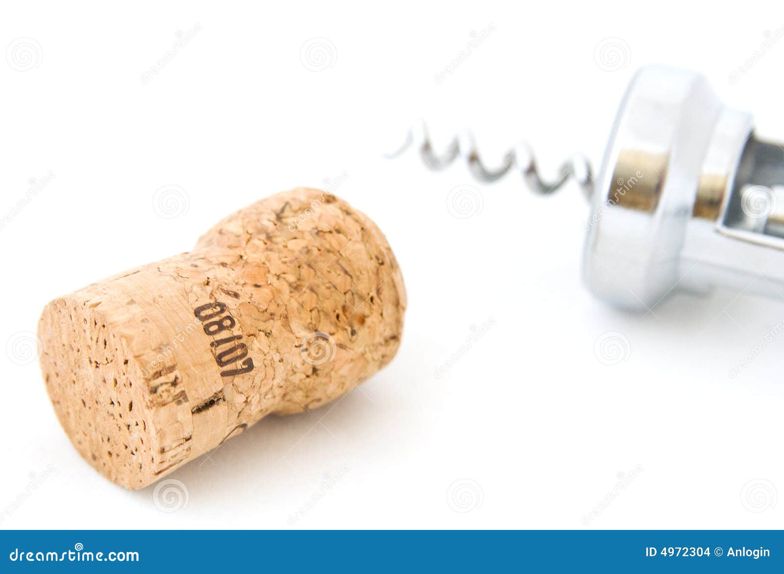 The cork lays on a background of a bottle corkscrew on a white background