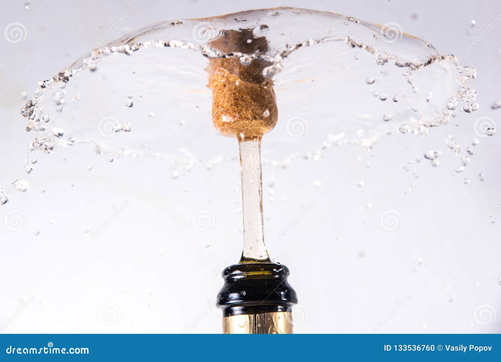 Cork Flying from a Champagne Bottle Under the Pressure of a Liquid