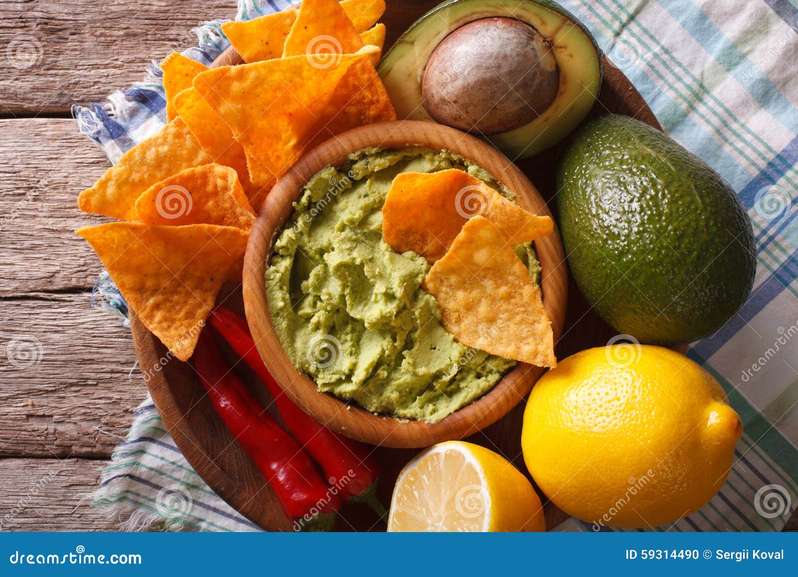 Corn Chips, Guacamole and Ingredients Closeup. Horizontal Top View