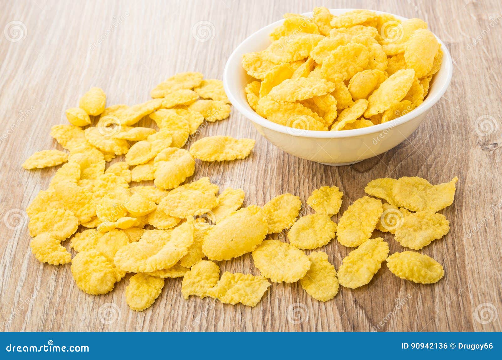 Corn Flakes in Glass Bowl and Scattered on Table Stock Photo Image of ingredient, heap 90942136