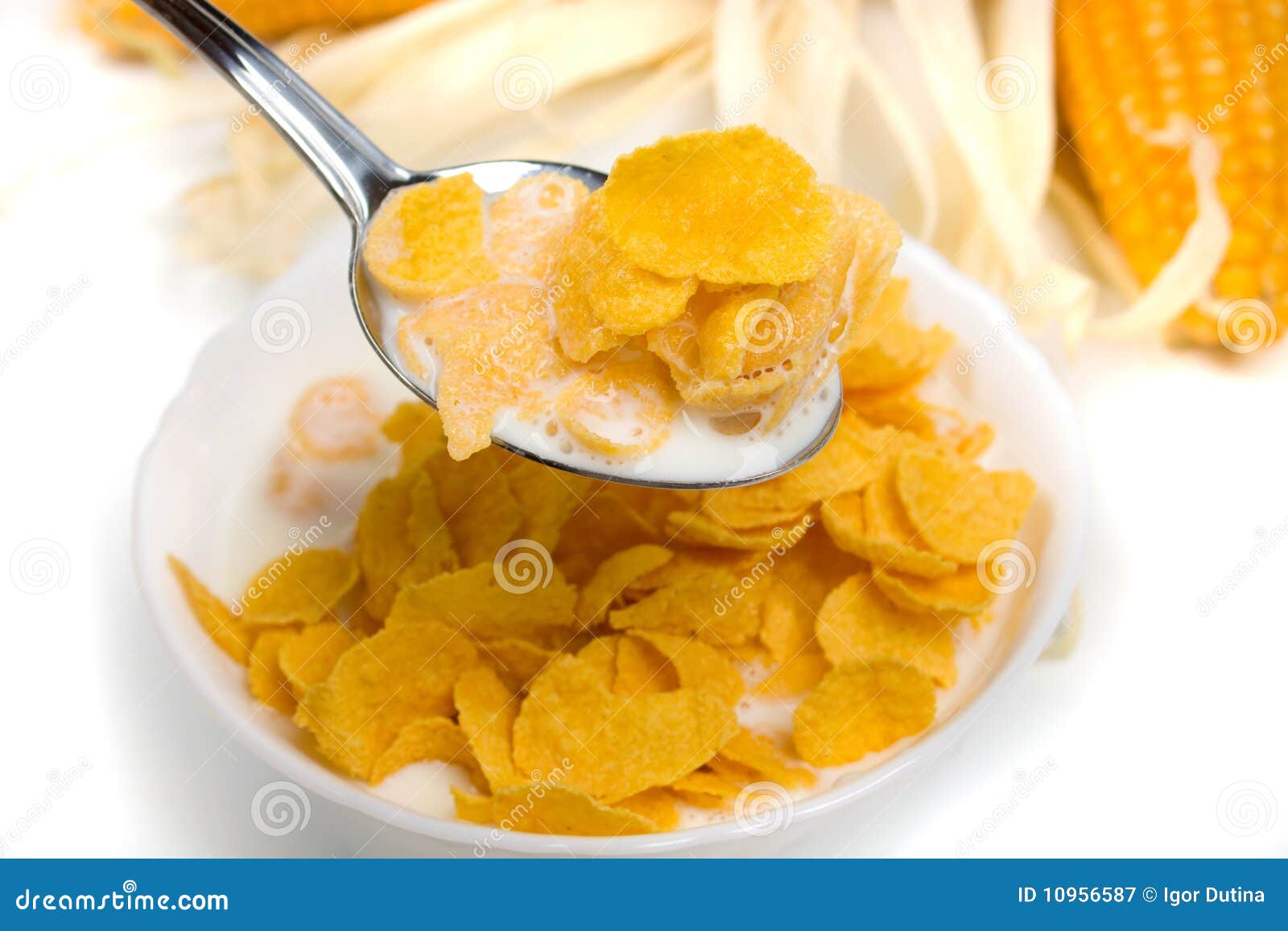 Corn flakes with milk stock image. Image of flakes, spoon 10956587