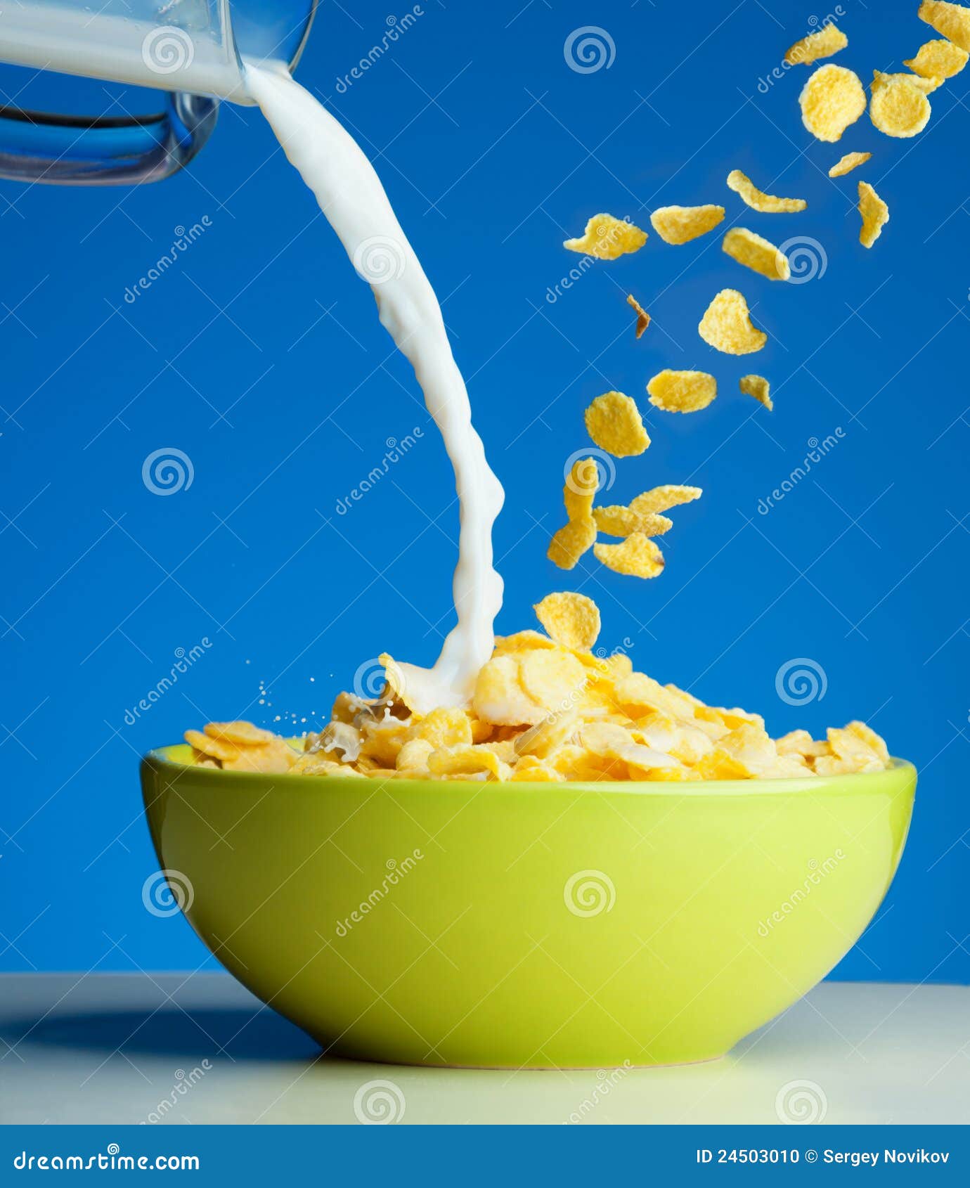 Corn flakes with milk stock photo. Image of drop, cornflakes 24503010