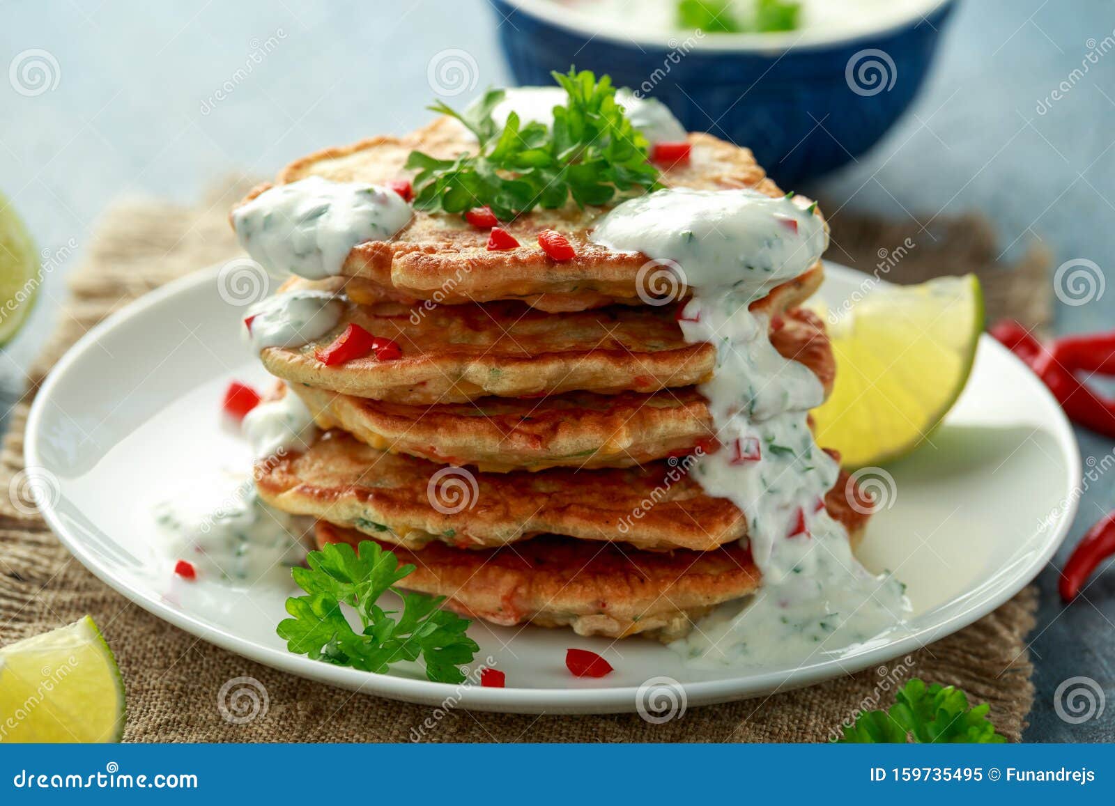 Corn Fritters, Pancake with Dip White Sauce, Lime and Chilli on White