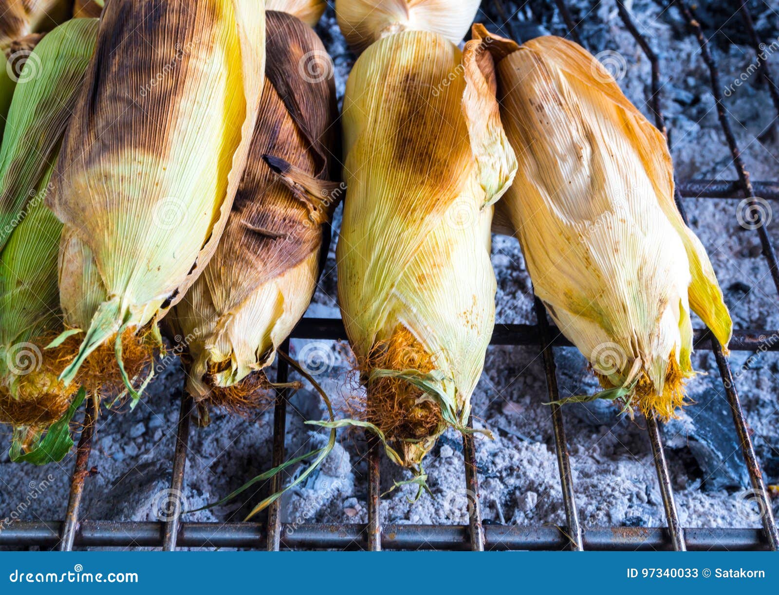 corn are grilled on grill grates