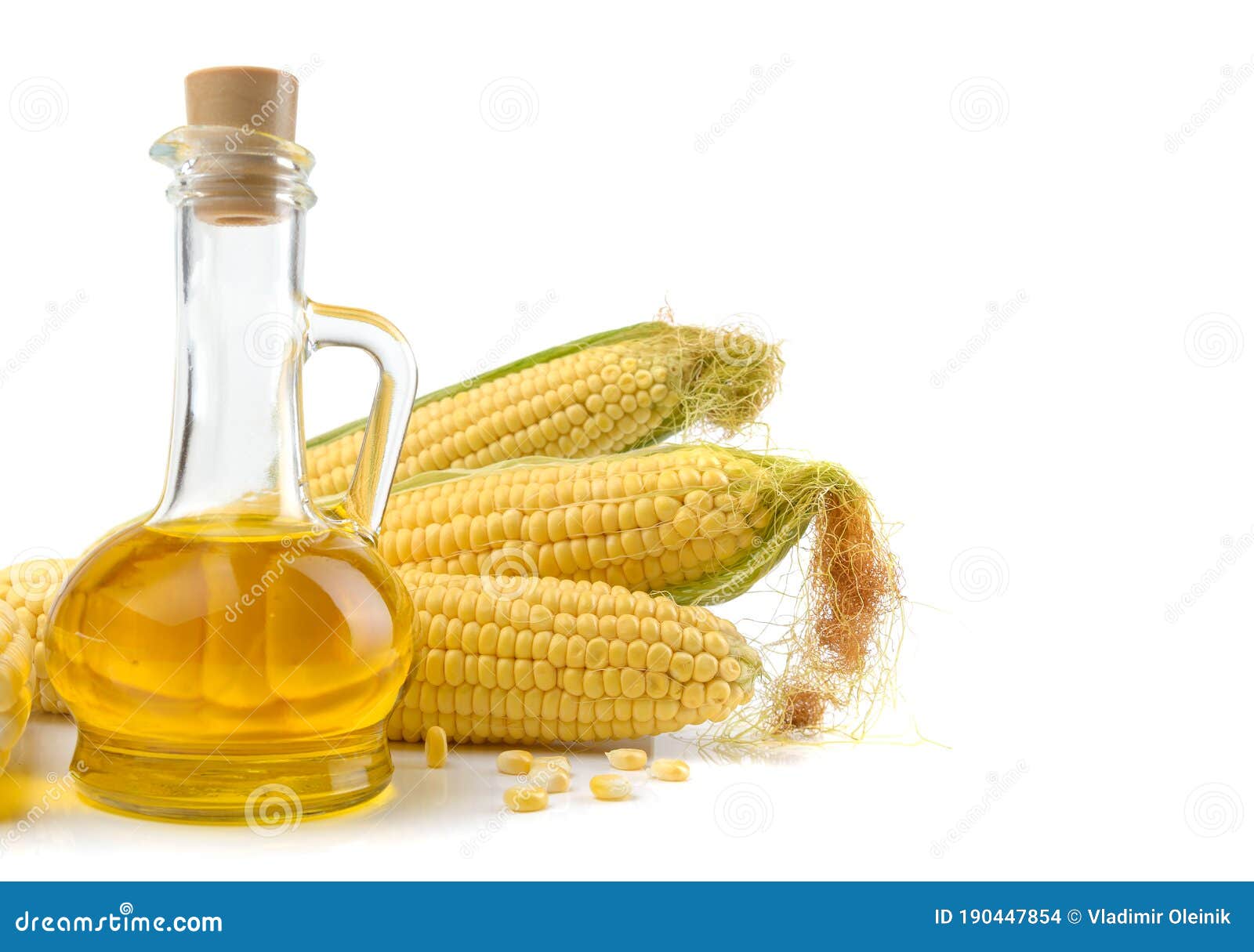 Corn Oil In A Carafe, Peeled Corn Cobs And Grains, Text Space Isolated