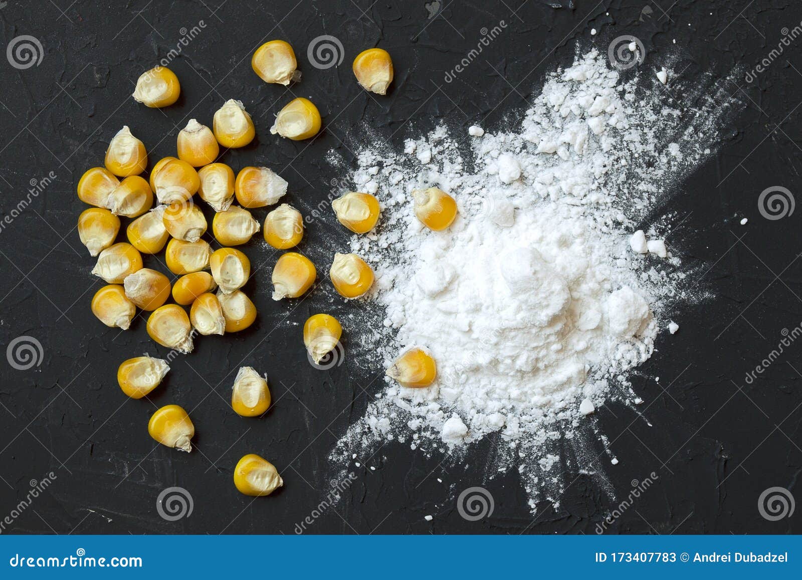 Corn Starch with Yellow Grains on a Black Background, Top View. Corn