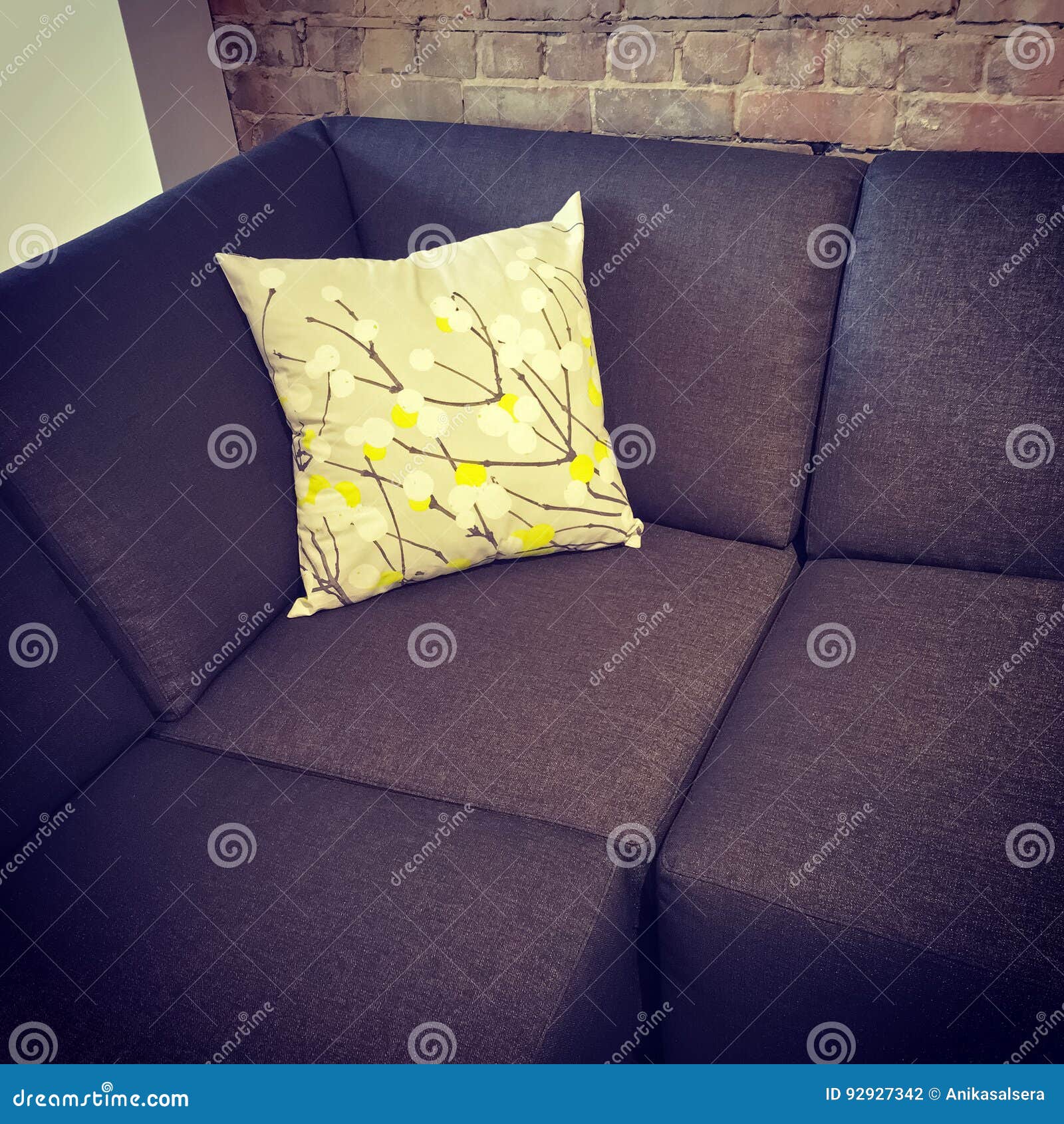 Corner Sofa with Cushion Near Brick Wall Stock Photo Image of style