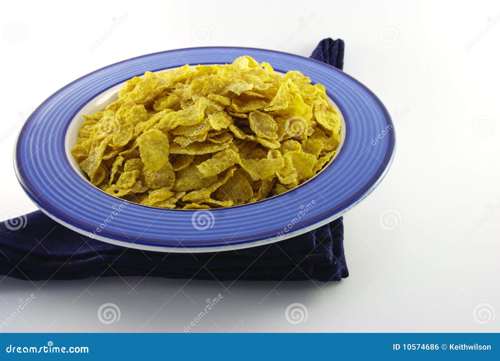 Cornflakes in a Blue Bowl stock photo. Image of meal - 10574686