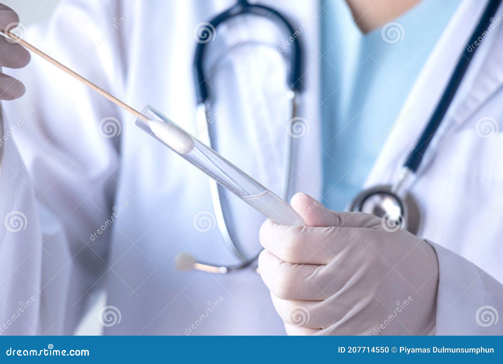 coronavirus covid-19 test concept. doctor hand with glove holding test tube with patient nasal secretion cotton swab sample