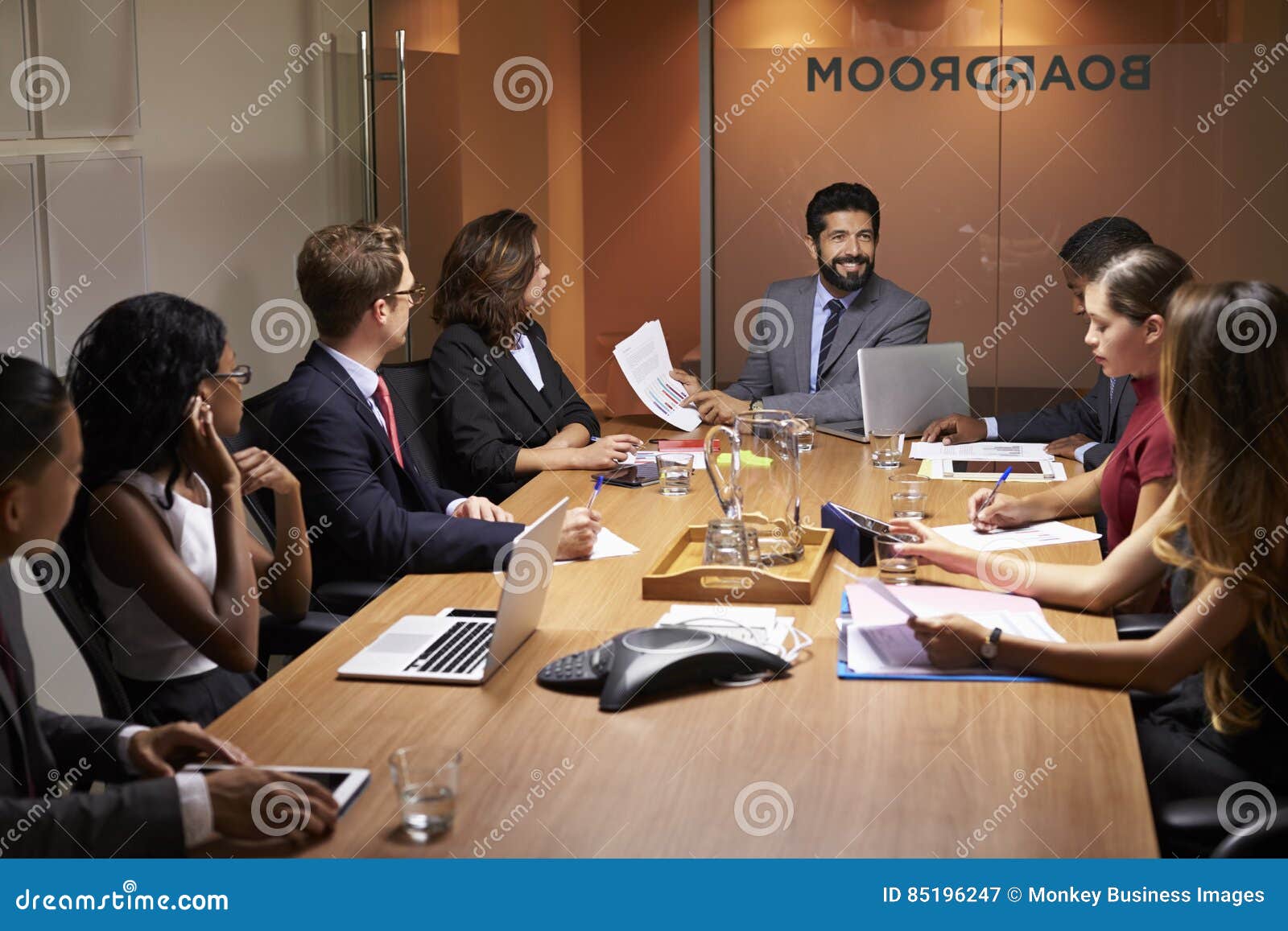 Corporate Business People At An Evening Boardroom Meeting