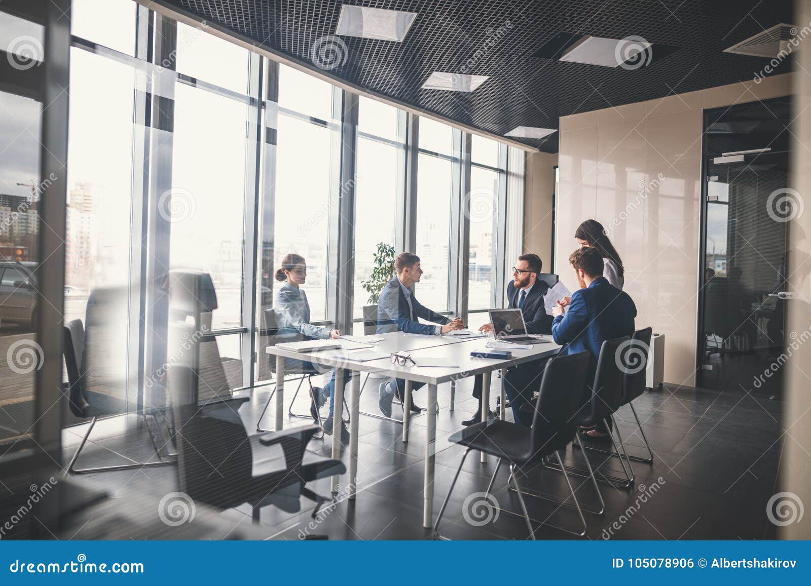 business team and manager in a meeting