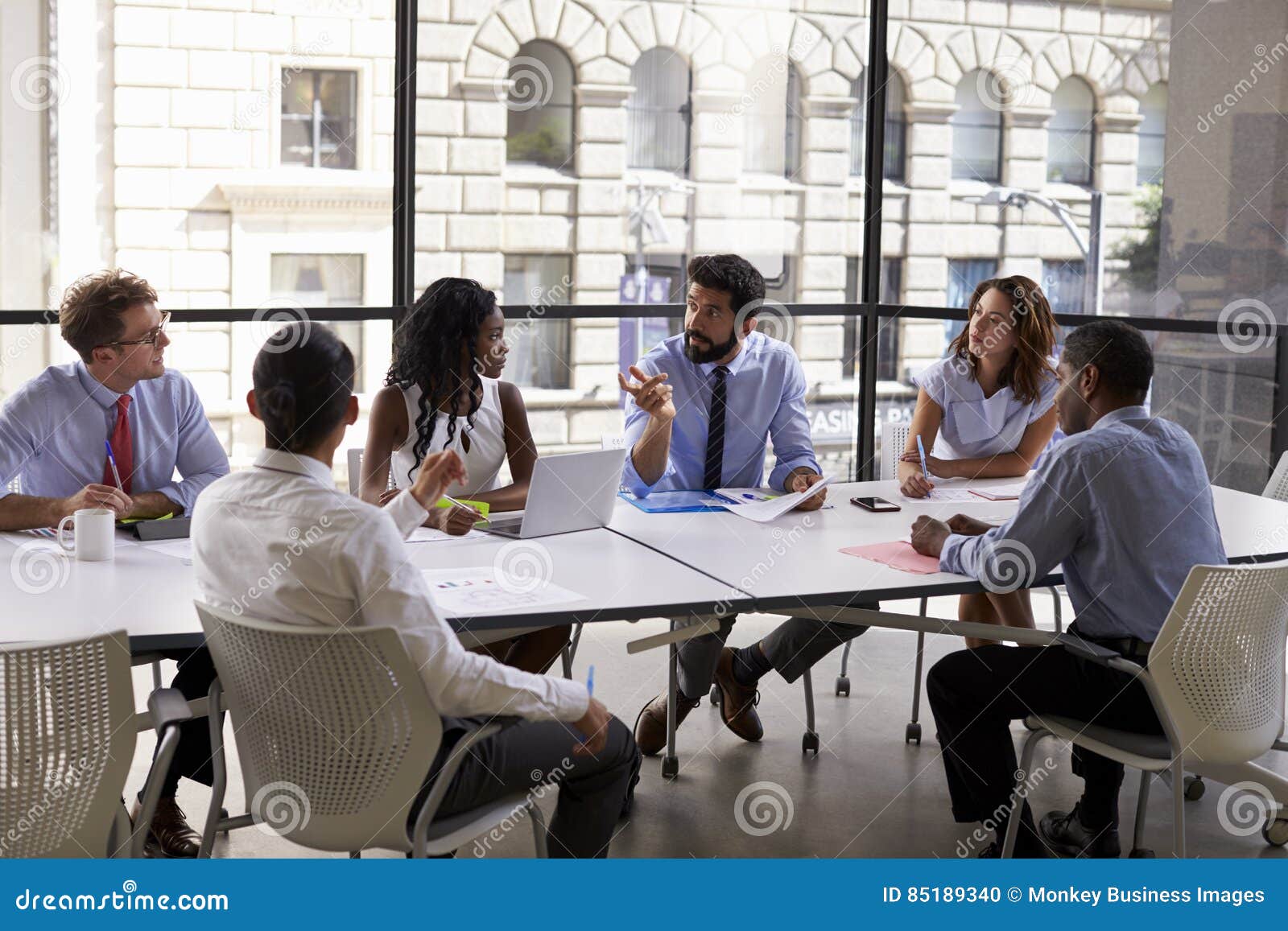 corporate business team and manager in a meeting, close up