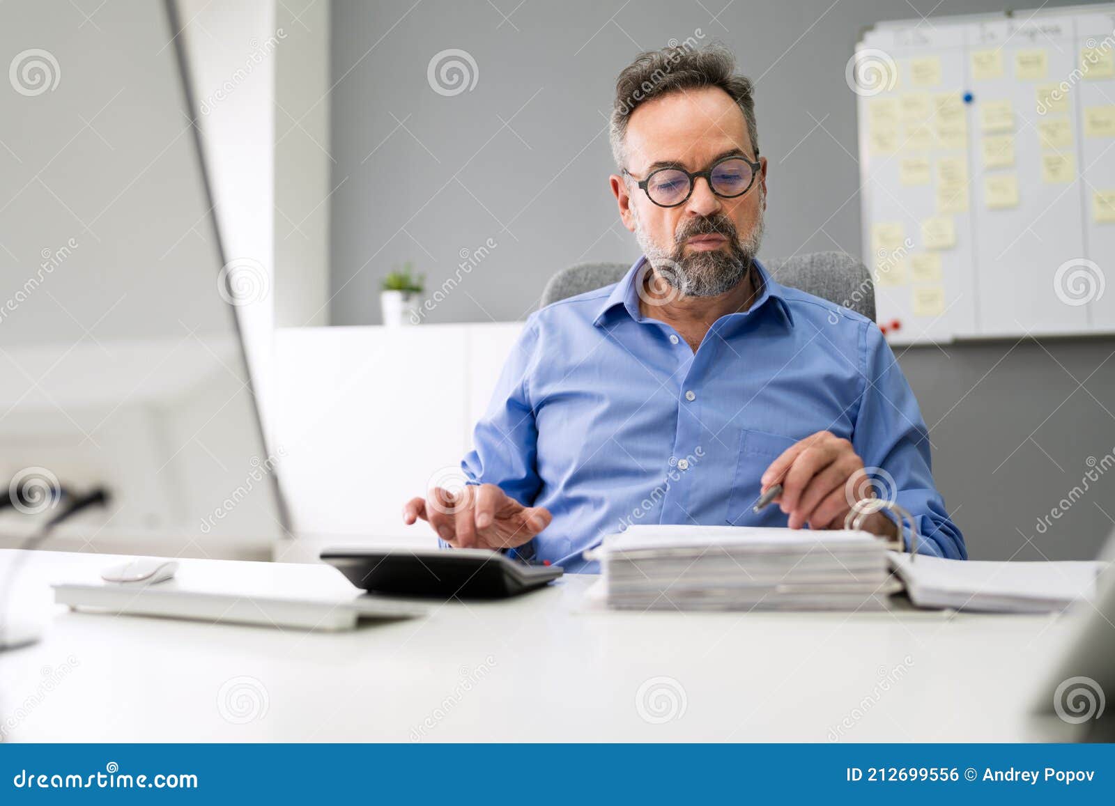 Corporate Tax Accountant Stock Photo Image Of Calculating 212699556 corporate-tax-accountant-stock-photo-image-of-calculating-212699556