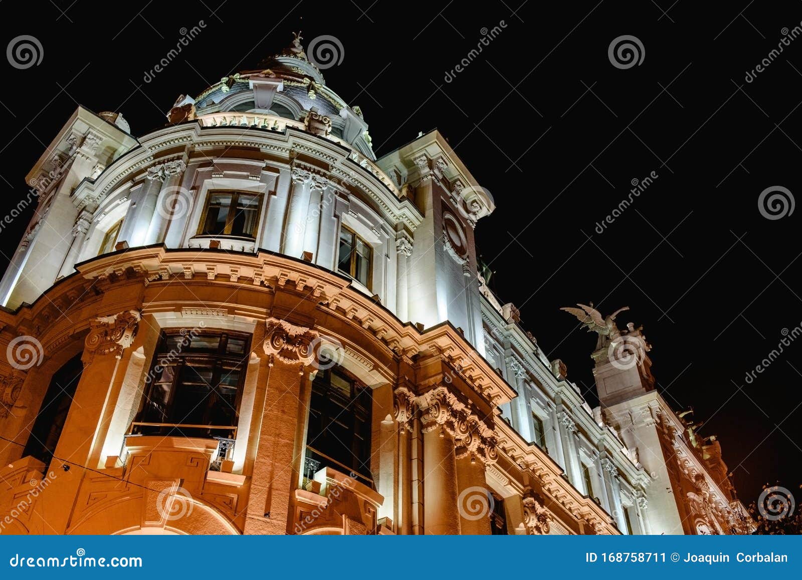 correos building in the town hall square of the mediterranean city of valencia, spain, illuminated at night