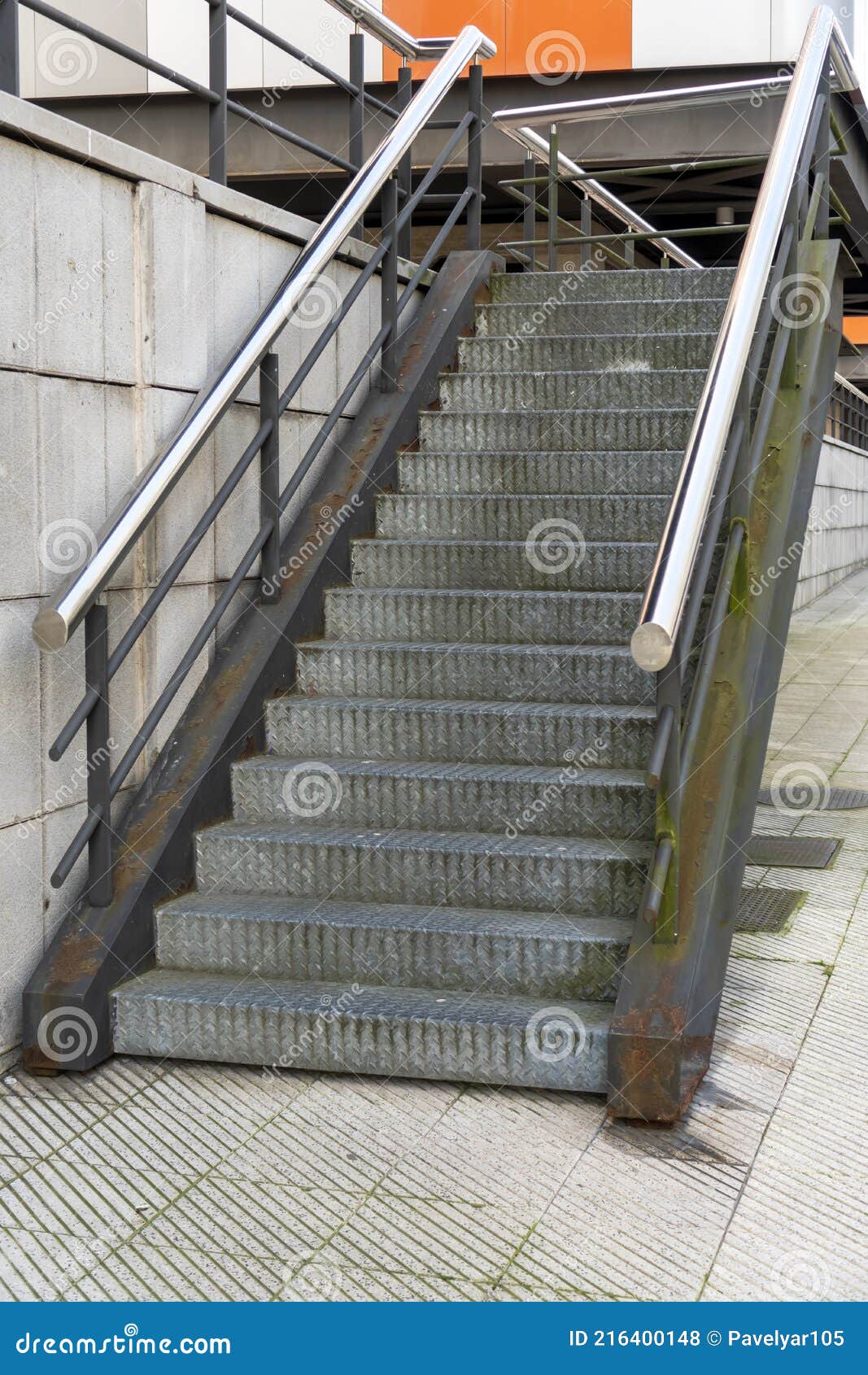 Corrugated Metal Staircase with Shiny Chrome Handrails Stock Photo ...