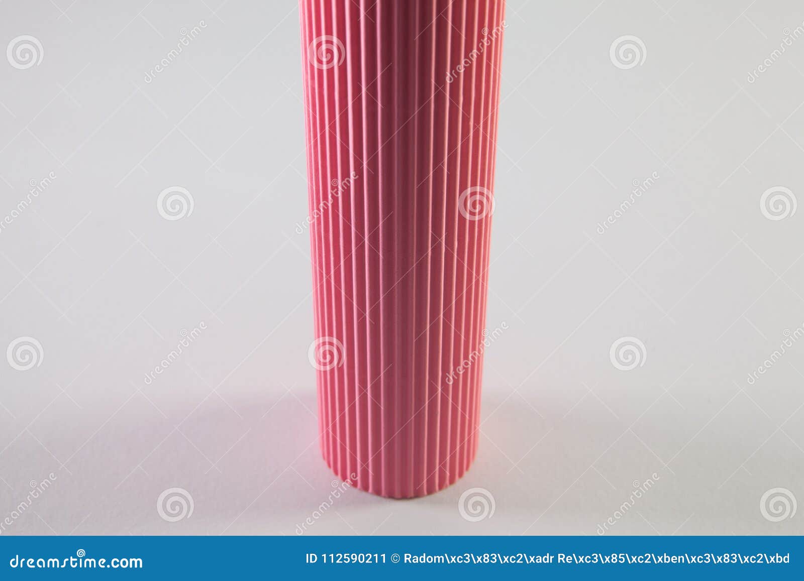 Corrugated Pink Paper Roll on the White Desk. Stock Image Image of