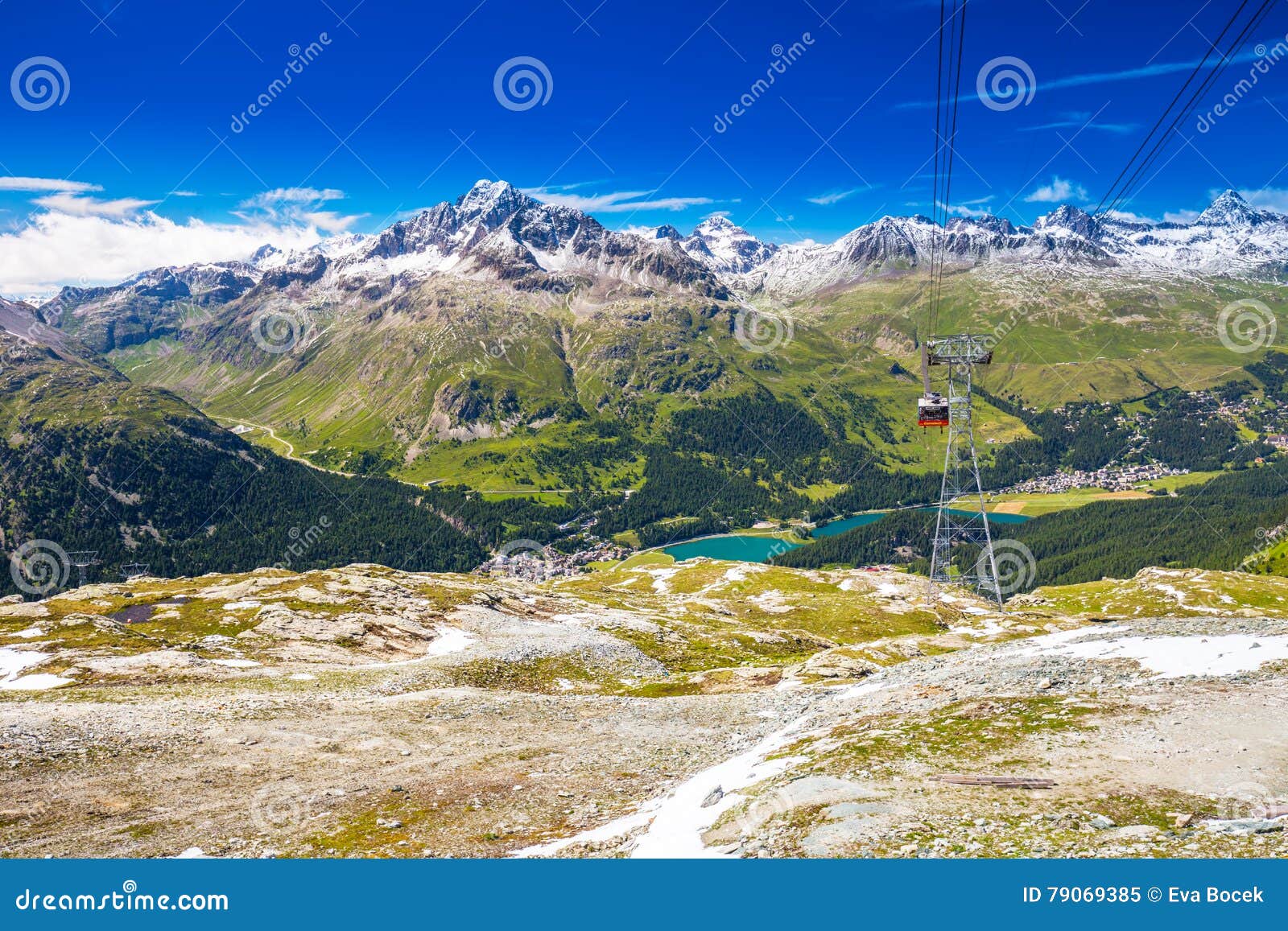 corvatsch cable car with upper engadin valley in swiss alps