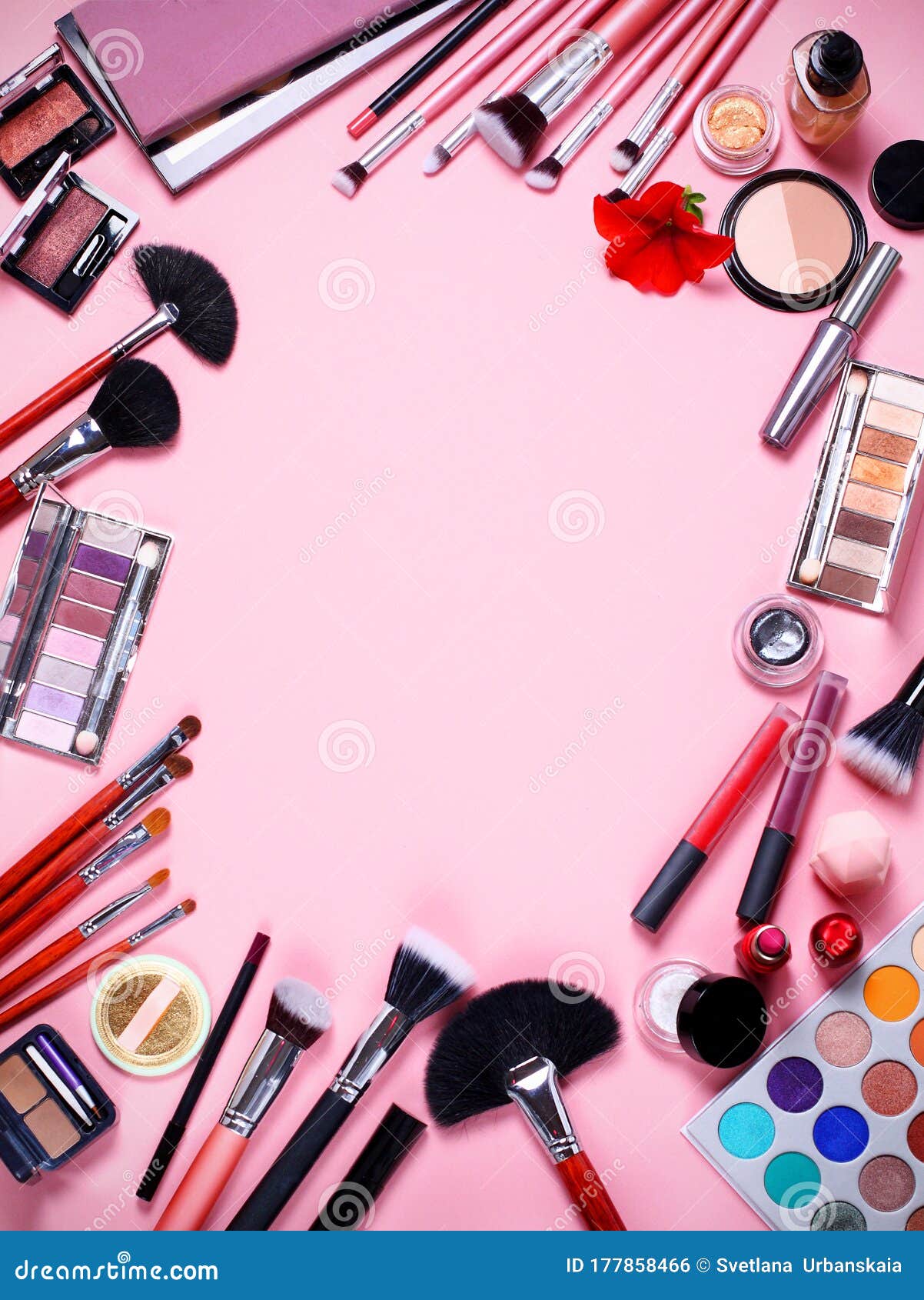 Cosmetics Background. Top View. Makeup Brushes and Cosmetics on a