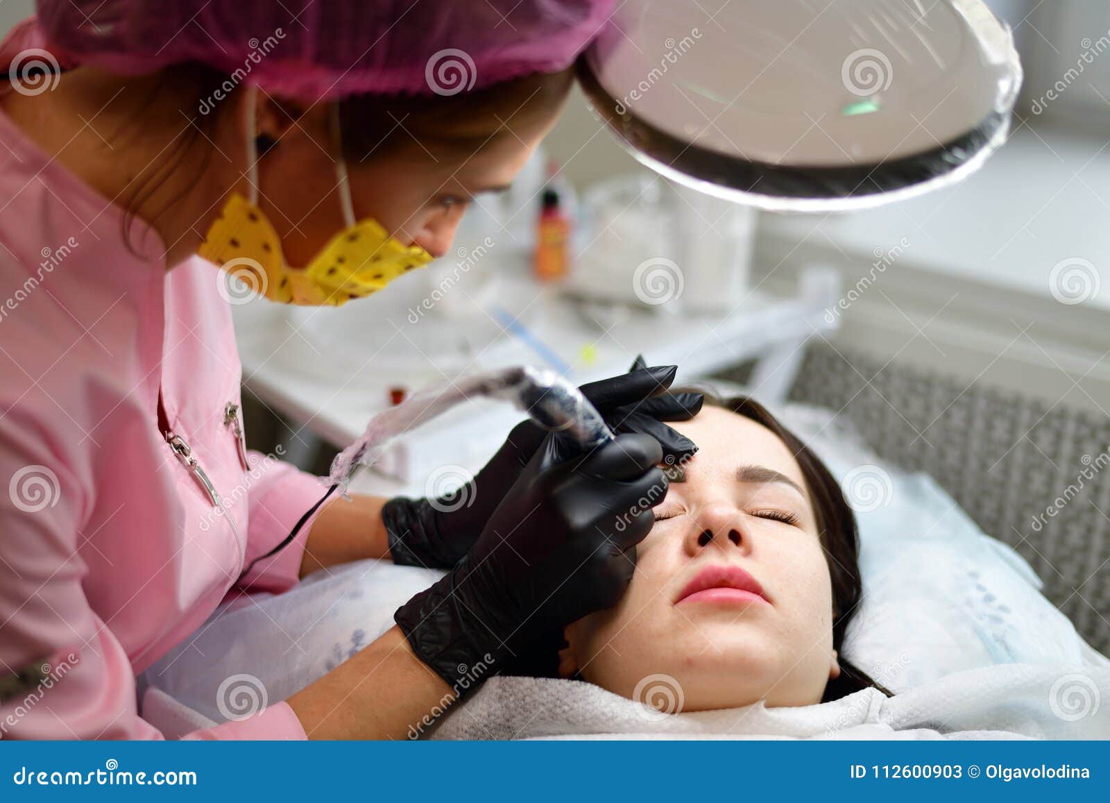 Cosmetologist Does Hardware Skin Care For Girl`s Face Stock Image