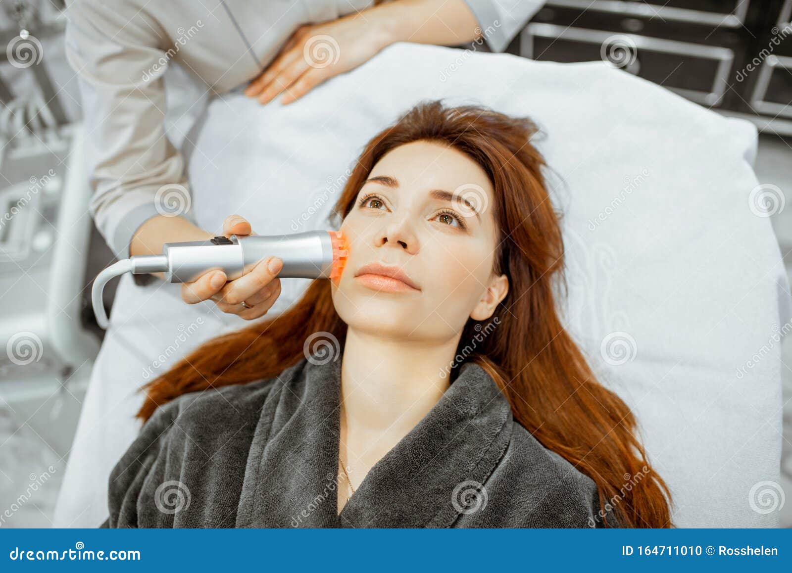 Cosmetologist Making Facial Treatment To A Woman Stock Photo Image Of